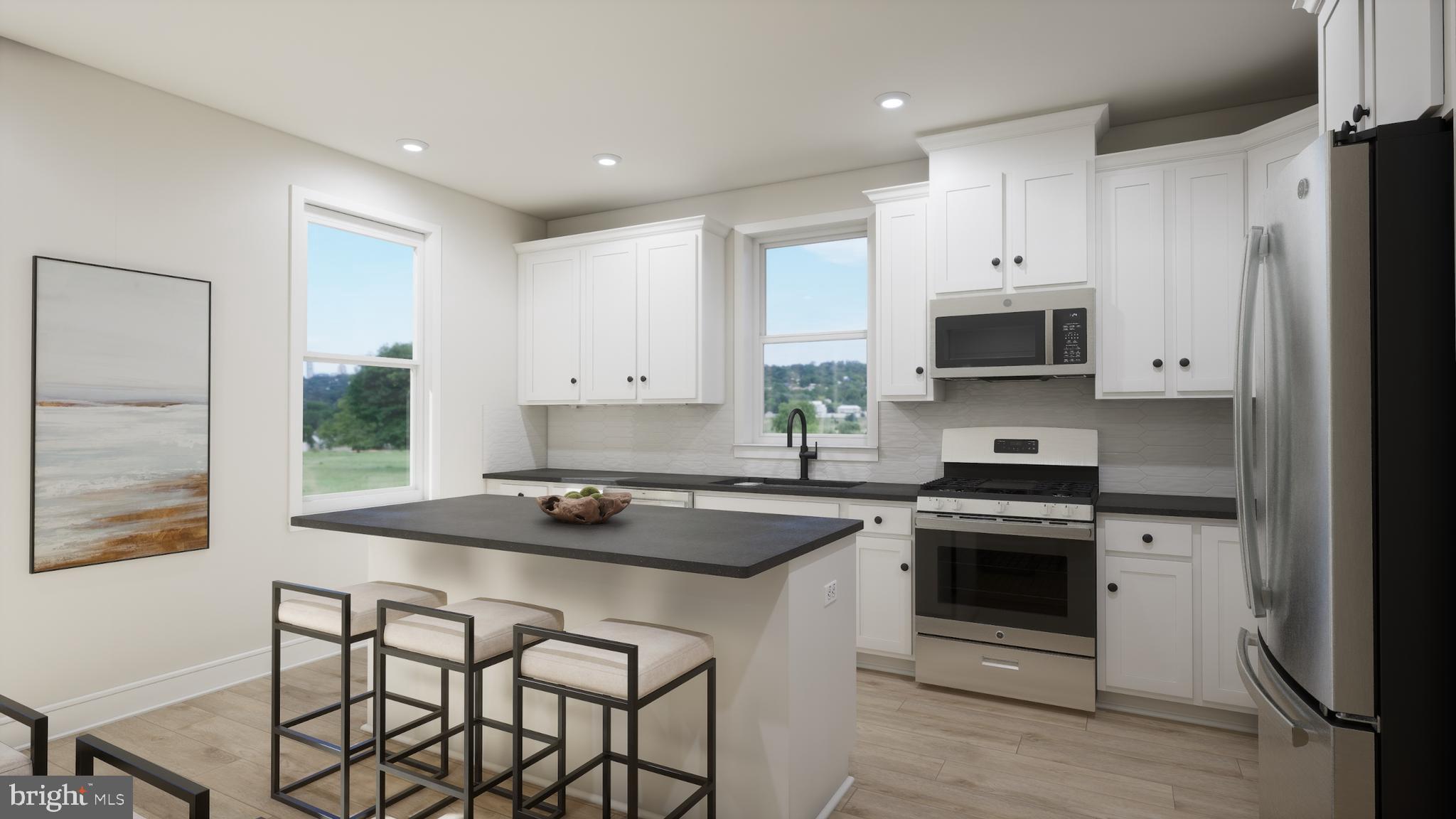 Come claim your opportunity to own this incredible home! This brand-new incredible END UNIT TOWNHOME-STYLE CONDOMINIUM by Van Metre Homes at DEMOTT & SILVER is available for you to call home APRIL 2025! Nestled within the Broadlands community, this prestigious COLLIER 24-R1-RT floorplan spans 2,031 finished square feet across 4 levels, offering an indulgent retreat with 3 bedrooms, 2 full and 2 half bathrooms complemented by a 1-car garage. Step inside and be greeted by an impeccably designed living space boasting 9' ceilings and sprawling luxury vinyl plank flooring, where the main level unfolds to reveal a great room adorned with a charming balcony and a forward-set kitchen. This culinary haven boasts upgraded cabinets, quartz countertops, stainless-steel appliances, and a central island, setting the stage for culinary delights and cherished gatherings. Ascend to the upper level to discover a haven of relaxation in the impressive primary suite, boasting dual walk-in closets and a lavish 4-piece bathroom replete with double sinks and an oversized, frameless shower enclosure featuring a built-in seat—an idyllic retreat for unwinding. Venture to the top level, where two additional bedrooms await alongside a well-appointed full bathroom, ensuring ample space for your needs and lifestyle. Meanwhile, the lower level beckons with a spacious, multipurpose rec room, a convenient half bathroom, and internal access to the private garage—offering seamless functionality and ease of living. But that is not all! Embrace the allure of urban living with a touch of luxury as you entertain guests or savor tranquil moments on the breathtaking rooftop terrace, where panoramic vistas await. This designer-curated home offers the spaciousness of a townhome paired with the low-maintenance, easy lifestyle of a condominium. Being a new build, your home is constructed to the highest energy efficiency standards, comes with a post-settlement warranty, and has never been lived in before! Don't miss out on this fantastic opportunity to own a home that combines modern luxury, thoughtful design, & a prime location – all at an incredible price. Schedule your appointment today! ----- Discover Demott & Silver, Van Metre’s exceptional community of townhomes and townhome-style condominiums nestled within the master-planned Broadlands community. This sought-after neighborhood offers unparalleled convenience with walking distance access to Metro’s Silver Line and the area’s most desirable amenities. Residents relish in a host of top-notch amenities across Broadlands, including a clubhouse, fitness center, three pools, tennis courts, vast green spaces, and extensive hiking and biking trails. With shopping, restaurants, Metro’s Ashburn Station, a bus stop, and nearby commuter routes at your fingertips, Demott & Silver is set to become the epitome of a superior community in Broadlands. ----- Take advantage of closing cost assistance by choosing Intercoastal Mortgage and Walker Title. ----- Other homes sites and delivery dates may be available. ----- Pricing, incentives, and homesite availability are subject to change. Photos are used for illustrative purposes only. For details, please consult the Community Experience Team.