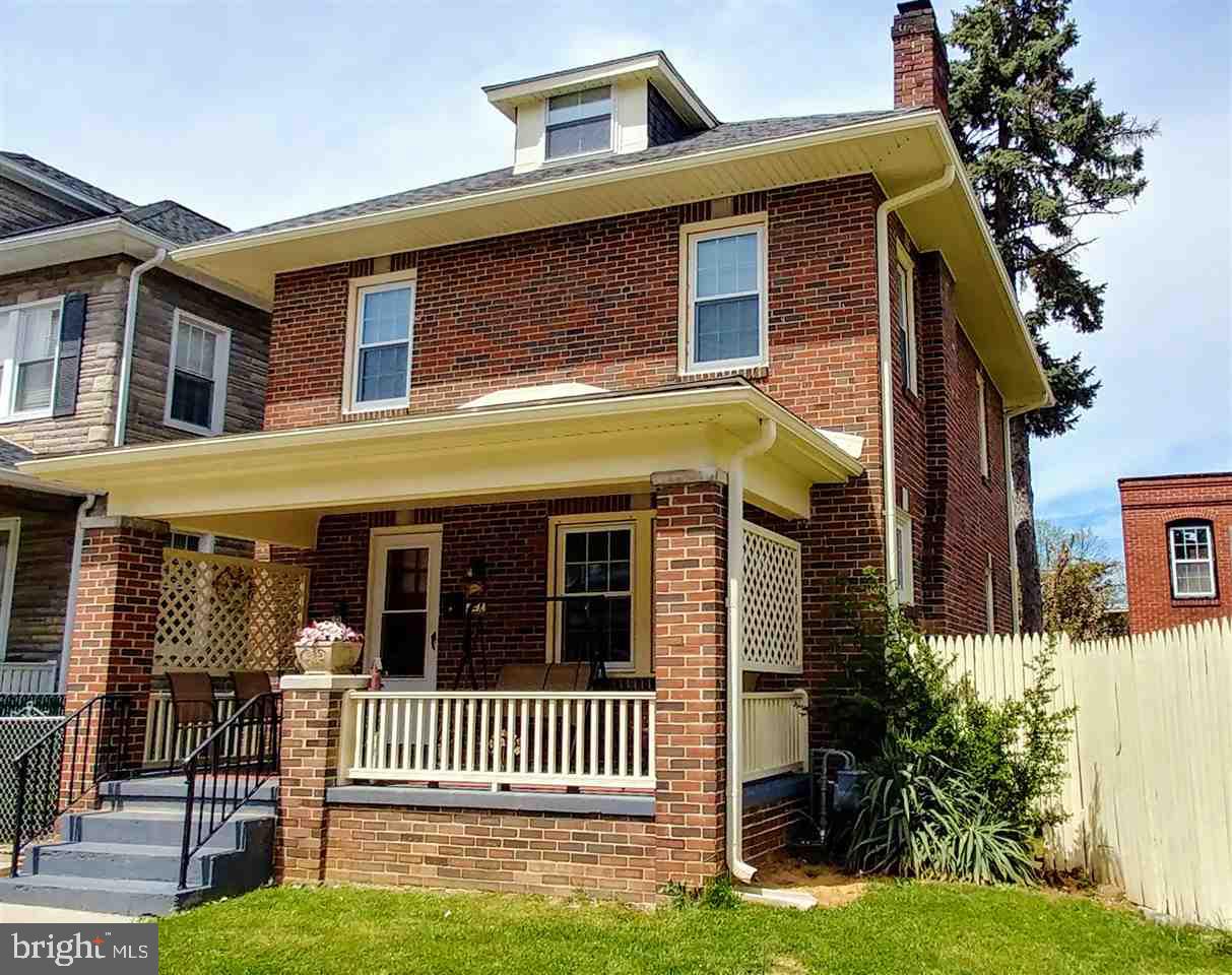 Beautifully remodeled brick two story home with fenced yard located close to York College.  Tile flooring in kitchen that opens to the dining area.  The attic can be used as a 4th bedroom (22.5 x 15.4).  Newer appliances, Newer water heater, and New windows.  1 car garage and off street parking in the fenced gravel side yard.  Move in ready!