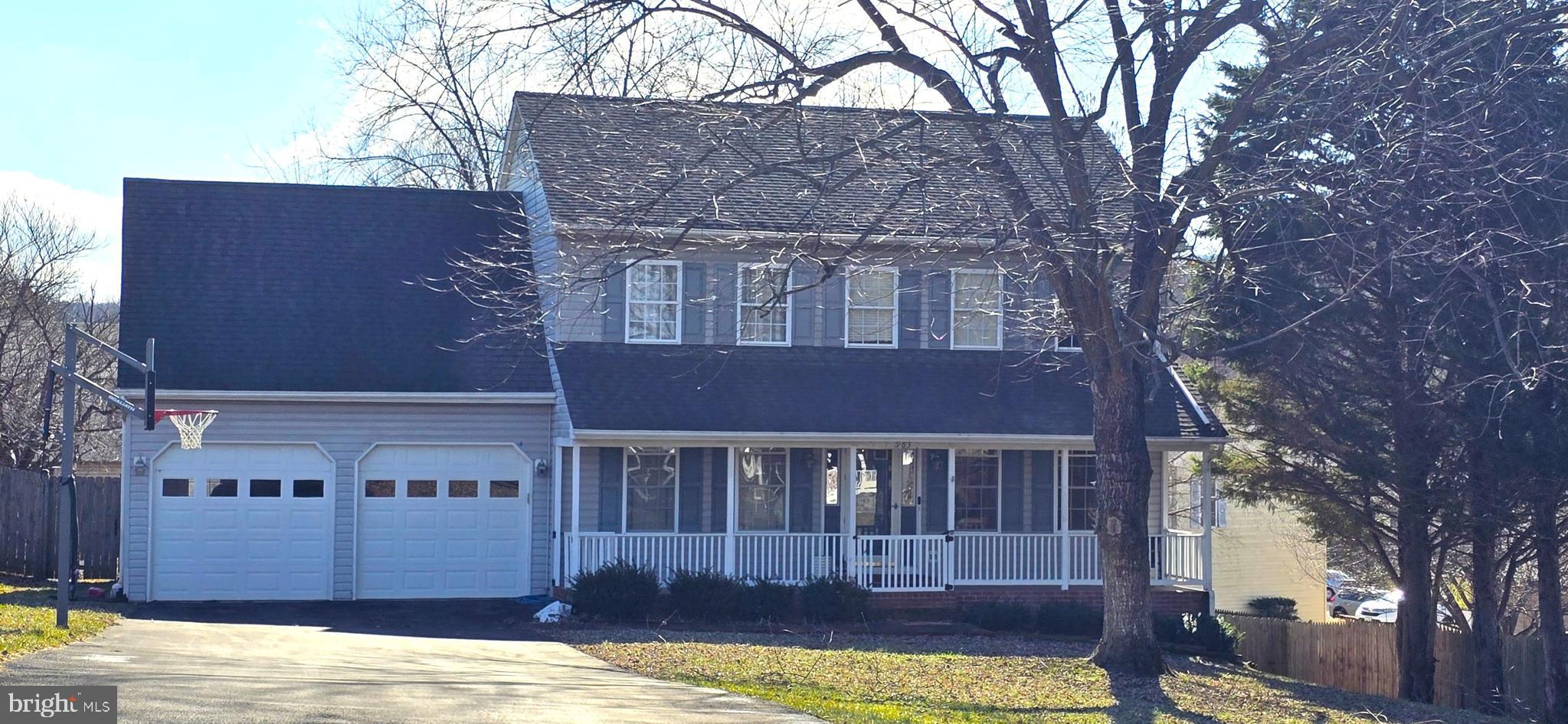 10K PRICE ADJUSTMENT! GREAT LOCATION! SPACE FOR EVERYONE! Lovely 3 bedroom/2.5 bath colonial home waiting for you in sought after Warren County location!  Close to everything including new hospital, middle school, in town shopping, dining, and more! INTERIOR FEATURES:  Primary suite is a treasure including a huge bonus room (20x13) that could be used as a cozy sitting room with privacy and skylights.  Primary bathroom has been updated with new lighting and vanity. Kitchen has been updated with stainless steel appliances - dishwasher 2022, fridge with ice maker 2020, microwave & oven 2020.  Half bath off kitchen with stackable washer & dryer 2022. Full unfinished basement has a walk out door and provides SO much space for storage or expanding! EXTERIOR FEATURES: Fabulous covered front porch  (33x6) you have been dreaming of with gate & recessed lighting.  Large backyard with space to play and relax. Deck (15x12) off the kitchen perfect for grilling!  Oversized two car garage with taller than usual doors and space for workbench (22x20.)  Fenced in rear yard is just waiting for your four legged family members to zoom around! UTILITIES: HVAC installed in 2016, water heater 2016