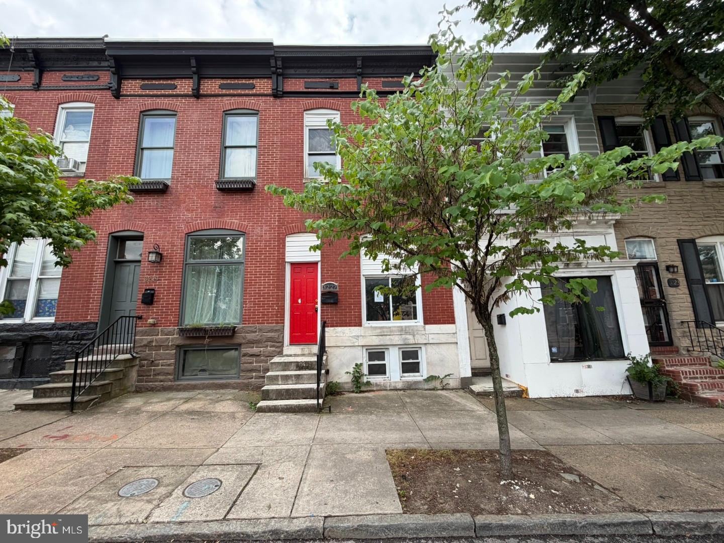 Just a short walk from Patterson Park, this home is ideally situated near Johns Hopkins Hospital, Canton Square, Fell's Point, and major commuter routes—this is city living at its best. As you arrive, you will find the cozy neighborhood with a beautiful front red door. Proceed inside and you will find that the main level features an ample living room with two large windows that brings natural lighting. The brick wall makes this a wonderful place to entertain. The separate dining room is in between the kitchen and living room and is ideal for entertainment. A half bath is perfect for your guest! From the kitchen you will see a door that leads you to the fenced backyard, which is ready to create a private outdoor retreat - you’ll love deciding between hosting a cozy dinner in your dining space or a more relaxed evening on your private rear patio. Retreat upstairs where you’ll find a truly special layout - 3 total bedrooms and a full bath. Need more space? The lower level delivers. The expansive unfinished basement can easily accommodate a flexible space for a home theater, office, workout area…the possibilities are endless! Schedule your showing today.