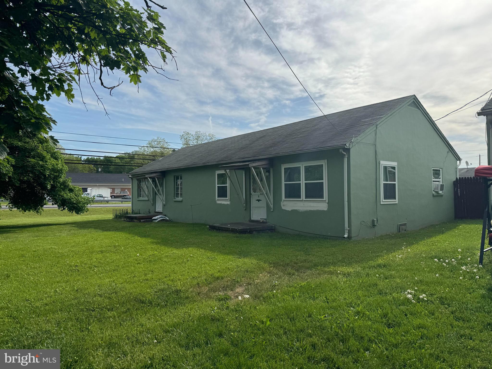 Two Buildings containing a total of four (2) bedroom one bath units.