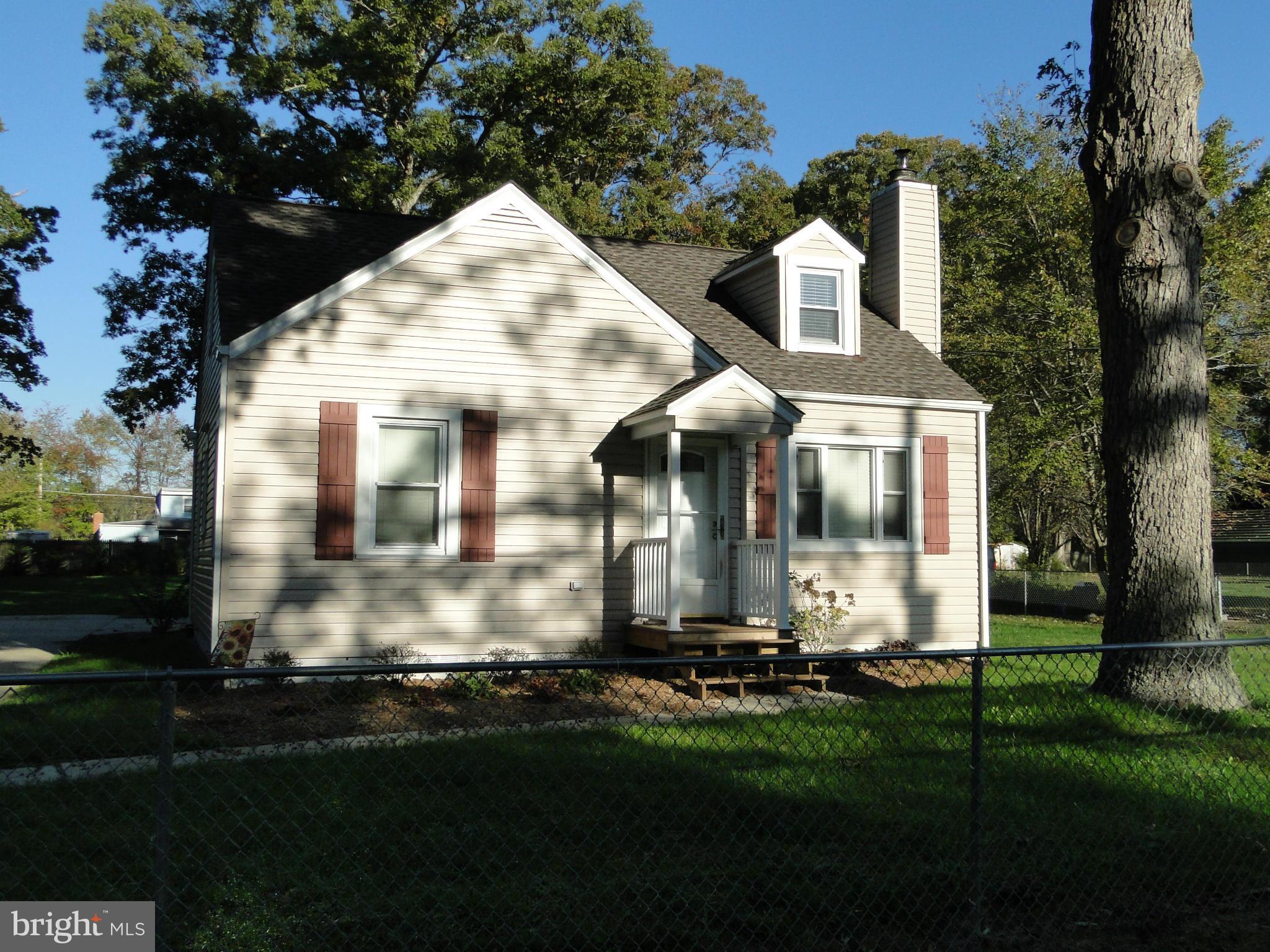 Charming updated single family home in Gwynn Park w/lg. fenced yard, off street parking& basketball court. Hardwood flooring on main level.Upper level bedroom has 1/2 bath attached, closet w/safe. Main level has hall bath w/shower/tub combo, one bedroom & office space, family room w/exit to back yard & living room w/pellet stove. Kitchen has glass backsplash & very workable.Baths have ceramic tile