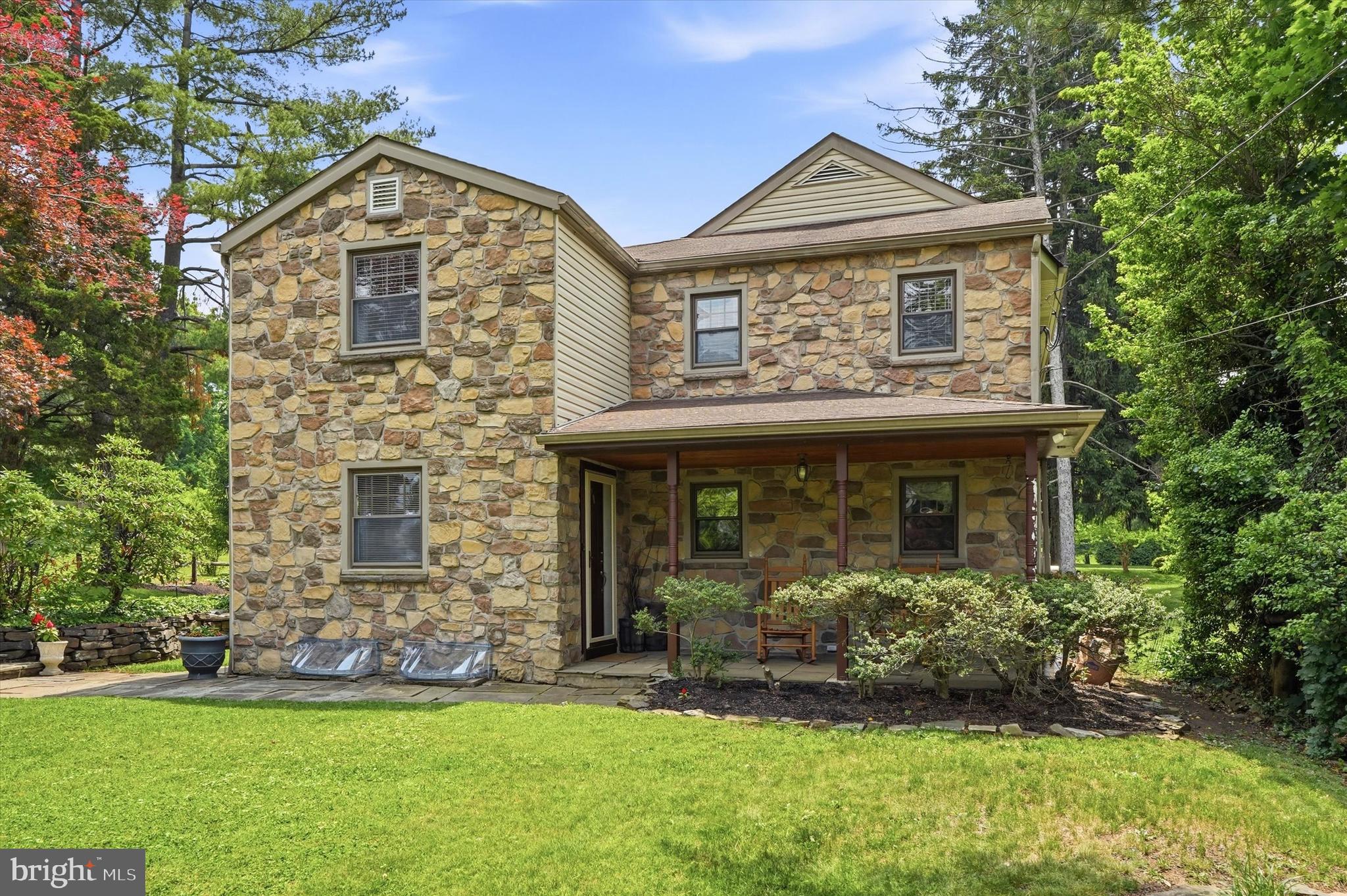 Nestled within the coveted Whitemarsh Township, 5038 Butler Pike is a 4 bedroom, 3 bath home that combines timeless craftsmanship, refined comfort, and an exceptional Montgomery County location. The home’s thoughtfully designed floor plan balances inviting gathering spaces with cozy areas for everyday living. The main level hosts a welcoming living room, a formal dining room, and a large, gourmet eat-in kitchen. The kitchen features premium solid wood cabinetry, a Kenmore Elite oven-and-half range & refrigerator, a Bosch dishwasher, an expansive center island, a built-in workspace, and well-sized pantry. Designed with both beauty and practicality in mind, the kitchen has abundant storage and direct access to the rear grounds for an indoor-outdoor lifestyle.A spacious first-floor laundry and mudroom serves as an organizational hub for modern living, complemented by a convenient full bath. Below, a full concrete basement provides storage and utility space. New HVAC system, a whole-house fan, new water softener and updated windows and doors throughout ensure comfort, efficiency, and peace of mind. Situated on its own dedicated staircase, the primary suite serves as a tranquil retreat, complete with an en-suite bath and a sense of separation rarely found in today's homes. The second floor is also home to 3 additional, generously sized bedrooms. A versatile third bedroom can access the primary suite, making it ideal for a home office, nursery, or creative flex space. The home's charming mid-century bathroom has been meticulously maintained, retaining its original character while remaining bright, functional, and inviting.  Outside, the property unfolds into a peaceful sanctuary. Mature landscaping and lush lawns surround the home, creating a serene setting. A covered patio invites outdoor dining and entertaining, while a charming cottage-style shed complements the picturesque grounds.Residents enjoy convenient access to local favorites: Harriet Wetherill Park, offers scenic walking trails, open green spaces, playgrounds, and recreational amenities, nearby Maple Acres Farm provides a cherished local farm experience, while Karamoor Estate Winery offers a unique local destination with beautiful vineyards and seasonal gatherings. The area is also just minutes from the expansive shopping, dining, and entertainment offerings of Plymouth Meeting/Ambler and the world-class retail destination of King of Prussia.With easy access to the Pennsylvania Turnpike, I-476, and I-76, residents easily connect to Center City Philadelphia, the Main Line, and the greater Philadelphia region.Located within the highly regarded Colonial School District and served by the acclaimed Whitemarsh Elementary School, 5038 Butler Pike represents a rare blend of quality craftsmanship, architectural character, top-tier education, and exceptional convenience.