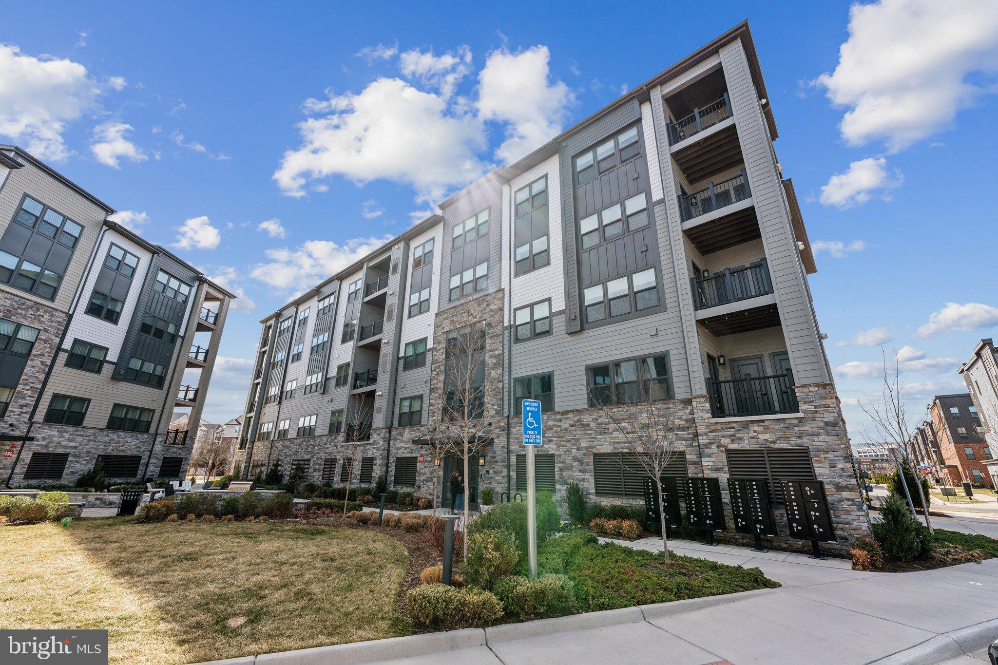 Gorgeous 2bd/2ba modern condo w/balcony located conveniently in MOSAIC AT WOODLAND PARK in Herndon.  Primary suite boasts HUGE walk-in closet!  Luxury living .  Modern , & upscale.  Built  in 2022.    Beautiful, open concept , and functionalty.  Great for entertaining!  Create fabulous meal in this easy flowing kitchen with white granite counter tops and country sink  and stainless steel appliances.  Entertaining flows easy to the balcony off the main room.  Designated parking spot in garage and plenty of guest parking.  EV station in front of building for added convenience. Close to Herndon-Monro Station on the Silver Line
Harris Teeter and restaurants close by, as well as Woodland Park across the street.  And an easy commute to Reston Town Center.  Come out and take a look!

Parking details: 1 designated parking space. in underground garage.
EV Chargers available in front of the building.