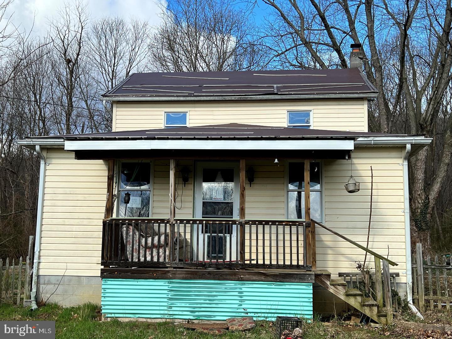 This very private home is situated on a little over 2 acres. This can be an investor's dream or make it your own. Offer Received. Please have all offers submitted by 12pm  February 19, 2024.