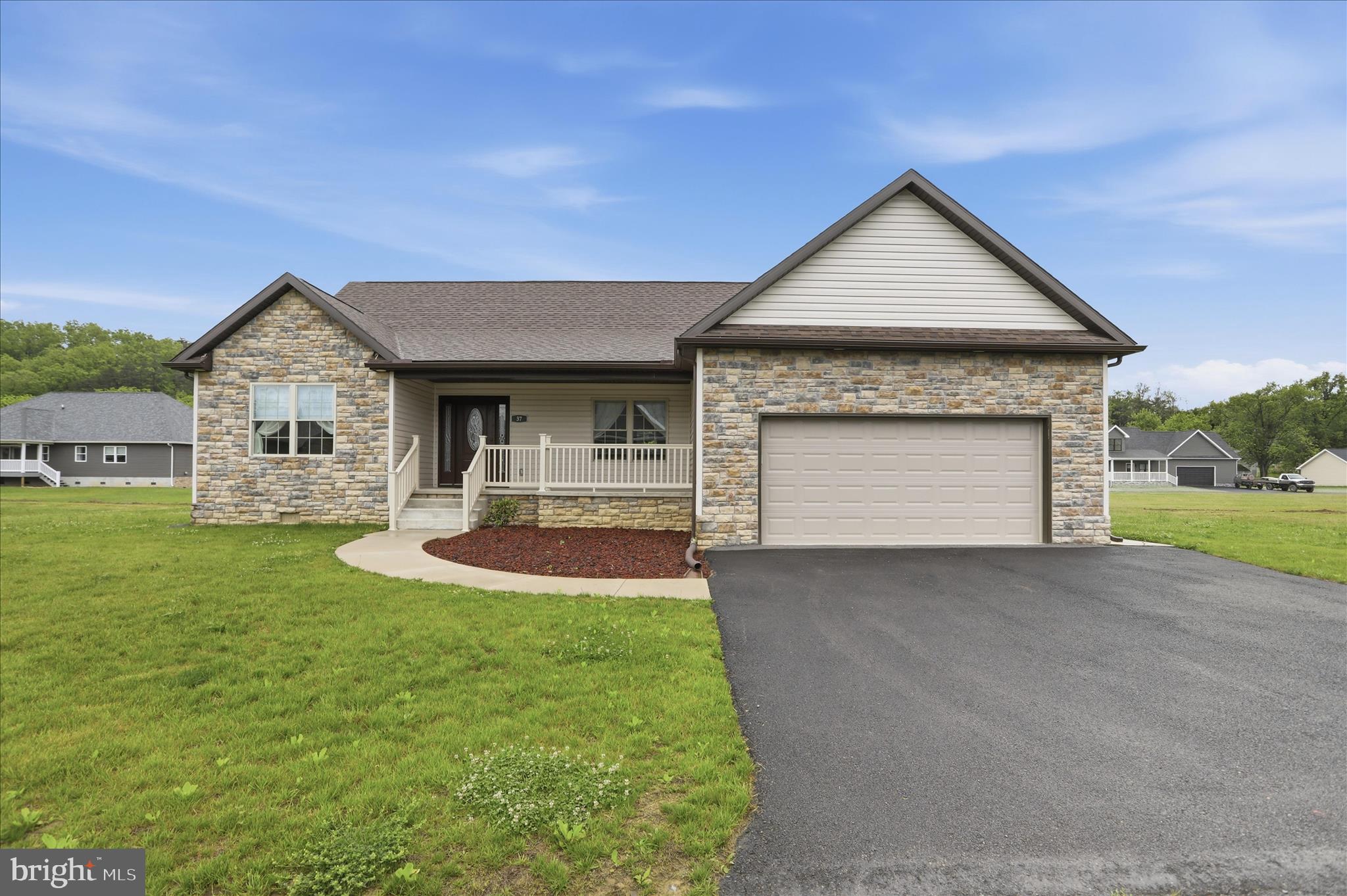 Like new and built in 2024, this beautiful 3 bedroom, 2 bathroom home offers the ease of single level living in one of Fort Ashby’s most sought after communities! Situated on a flat yard with a storage shed out back, this property combines modern comfort with a peaceful neighborhood setting. Enjoy wonderful walking areas and community creek access complete with a picnic area — perfect for relaxing and spending time outdoors.
Inside, you’ll love the stylish the granite-waterfall island and countertops, open living spaces, elwctric fireplace in the living room and a spacious primary suite featuring a walk-in closet. The attached garage with interior access adds everyday convenience and functionality. Having been hardly lived in, this home still feels brand new and is move-in ready!
Conveniently located less than a mile from the heart of Fort Ashby with restaurants, grocery shopping, an ice cream stand, and more nearby. Plus, commuting is easy with Northrop Grumman and many other job opportunities just approx. 15 minutes or less away!