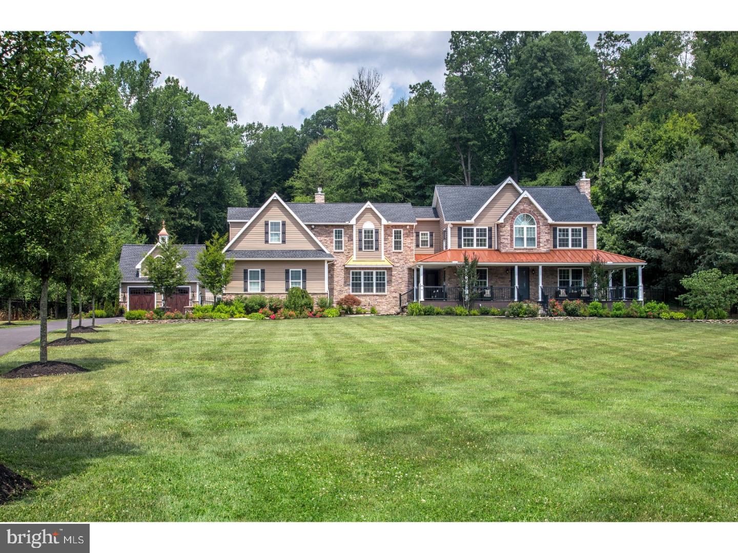 SALE PENDING On the border of Lehigh and Berks counties, this magical estate brings luxurious surprises in a convenient location minutes from Lehigh Valley Hospital, shopping and dining destinations, and essential commuter routes. Endless Oasis is a 3.43 acre estate with a stunning home, well-appointed outbuildings, and unparalleled recreation and entertaining venues.          Thoughtfully designed with forward thinking home automation and beautiful appointments in every room, the 8,000 square foot residence offers hand scraped oak floors, solid wood doors, detailed millwork, and three fireplaces. The kitchen gleams with Thermador appliances, granite and travertine marble surfaces, custom cabinetry and a view of the loft library. Five bedrooms and five and one half baths include the sumptuous master bedroom suite with tray ceiling, jetted air tub, walk-in electronic shower, and dual walk-in closets. The lower level features a second kitchen and a state of the art 10-seat theater room with climate control and Dolby surround sound.  Resourcefully designed for year round enjoyment, the saltwater swimming pool and hot tub can be fully enclosed by a retractable dome. Strolling the private and meticulous grounds leads to an amazing array of plantings, a koi pond with footbridge, carriage house with upper level office, 29'x44' pole barn with freight elevator, and portable greenhouse.        Filled with the unexpected, this memorable property is an impeccable showpiece, yet abundant warmth and character make it a treasured home.