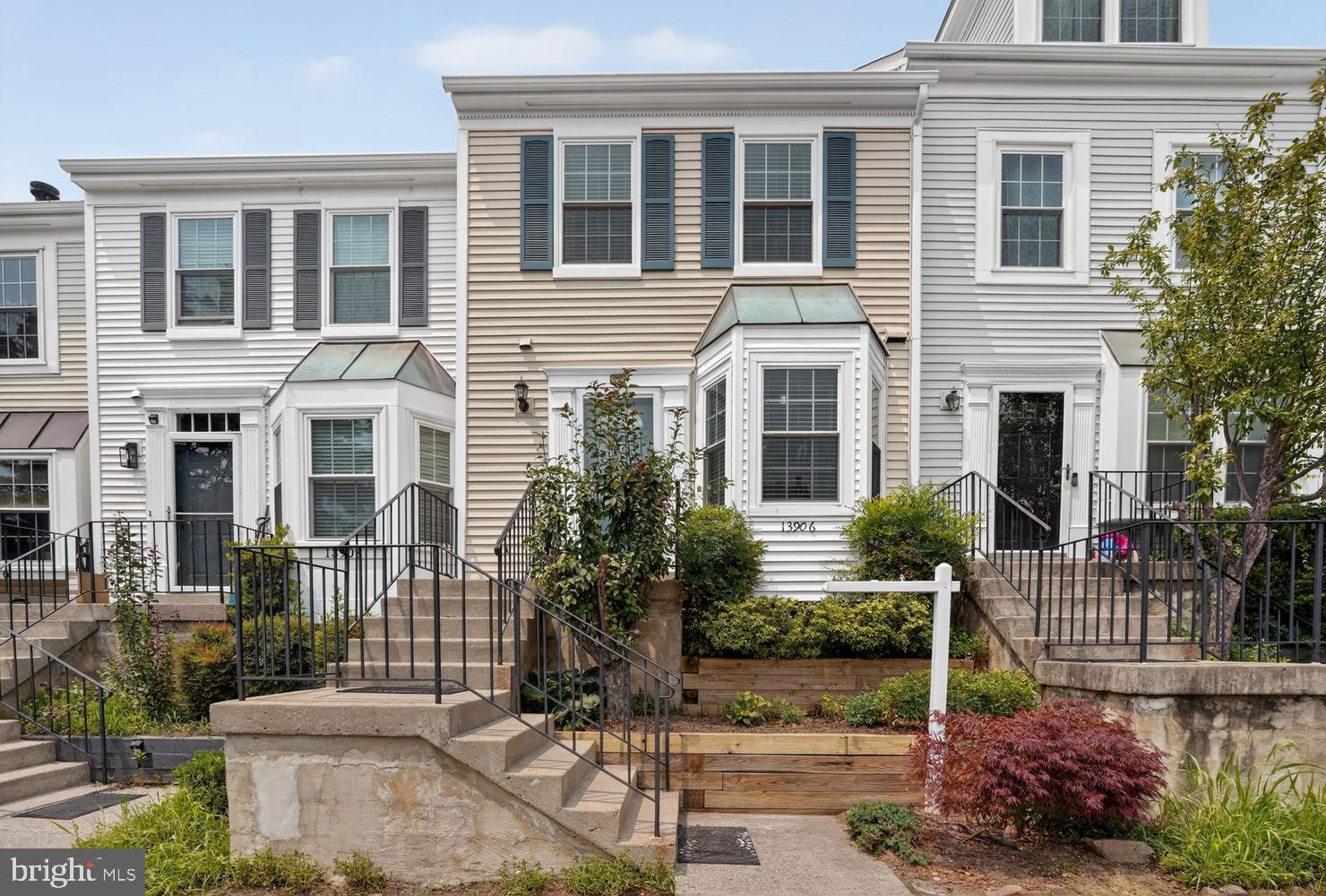 Nestled in the charming community of Singleton's Grove, this beautifully updated townhome combines modern finishes, comfortable living spaces, and an unbeatable Centreville location. The heart of the home is the stunning, brand-new kitchen featuring white Shaker cabinetry, elegant quartz countertops, a new sink, updated flooring, and a complete suite of stainless steel appliances, including a refrigerator, range, built-in microwave, and dishwasher. The bright, open floor plan creates an inviting space that's perfect for both everyday living and entertaining. Upstairs, the spacious primary suite offers a peaceful retreat with a soaring vaulted ceiling, a contemporary lighted ceiling fan, and a beautifully renovated en-suite bath featuring a new vanity, lighting, fixtures, and flooring. An additional generously sized bedroom and an updated full bath complete the upper level. The dramatic walk-out lower-level family room features a soaring two-story ceiling, creating an open and airy atmosphere. A cozy wood-burning fireplace provides the perfect gathering spot, while the walk-out access leads to a private, fenced backyard—ideal for outdoor entertaining, gardening, or relaxing in a peaceful setting. Two reserved parking spaces (#149 and #150) are conveniently located directly in front of the home, with the community mailbox just steps away. Residents of Singleton's Grove enjoy outstanding community amenities, including an outdoor swimming pool, community center, basketball and tennis courts, tot lots, and beautifully maintained common areas. Spend warm summer days by the pool or enjoy the neighborhood's recreational facilities and walking areas. Ideally located near shopping, restaurants, and everyday conveniences, this home also offers excellent commuter access to Route 28, Interstate 66, and Fairfax County Parkway.