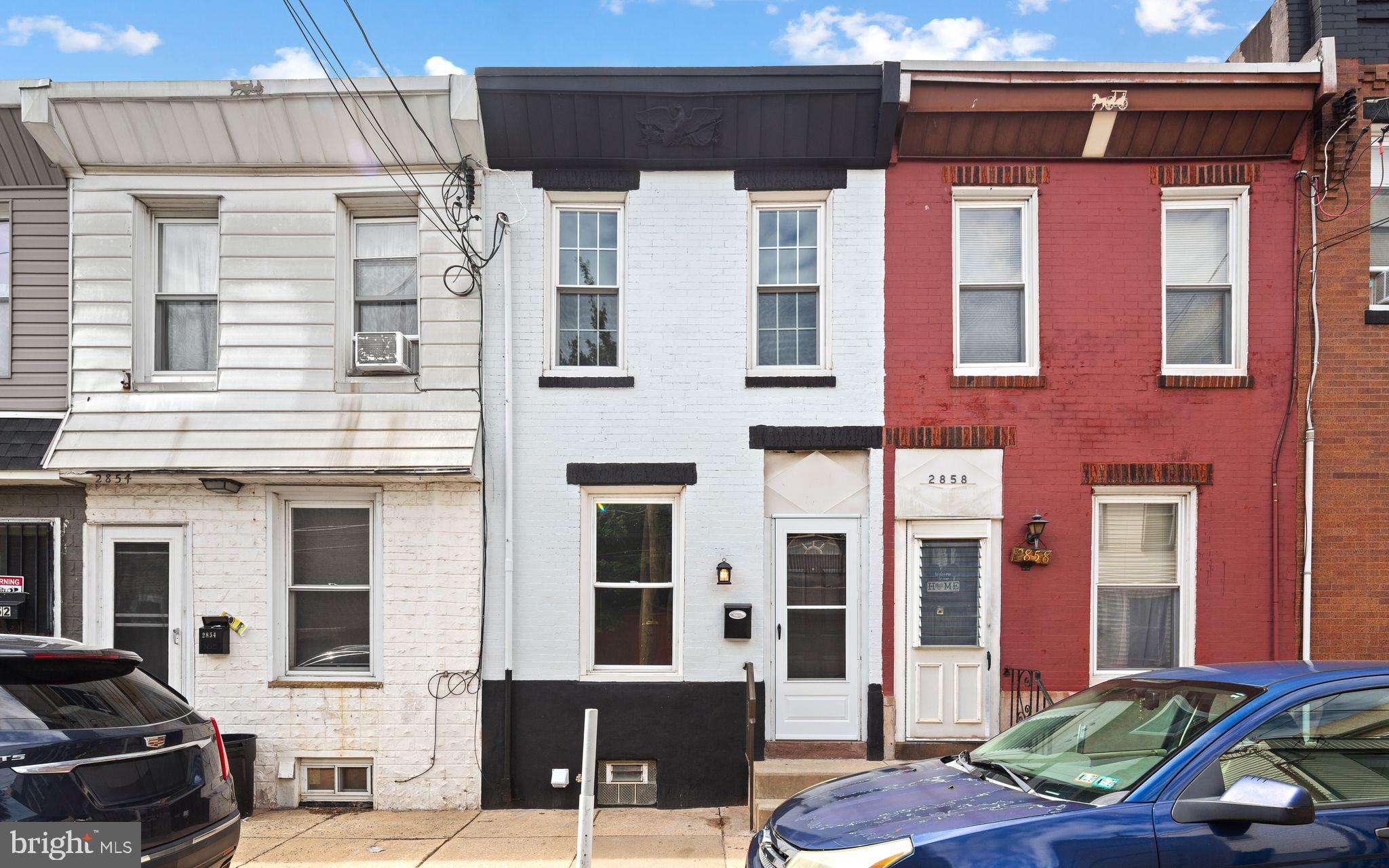 Welcome to this beautifully renovated 2-bedroom, 1.5-bath interior row home in the heart of Port Richmond.  Blending modern updates with classic Philadelphia charm, this move-in ready home features an exposed brick accent wall that adds warmth and character throughout the main living area. The first floor boasts new luxury vinyl plank flooring and fresh paint. The updated kitchen offers modern shaker style cabinetry, stylish finishes, granite countertops, and plenty of space for cooking and entertaining. Upstairs, you'll find two comfortable bedrooms and a tastefully renovated full bathroom.  Fenced rear yard is a nice place to cook out, garden, or sit and relax after a long day.  Stay comfortable year-round with energy-efficient mini-split systems providing heating and cooling throughout the home. Whether you're a first-time buyer, downsizer, or investor, this low-maintenance property offers the perfect combination of modern amenities and city convenience.  Located just minutes from local restaurants, shopping, public transportation, and major highways, this Port Richmond gem is ready for its next owner. Schedule your showing today!