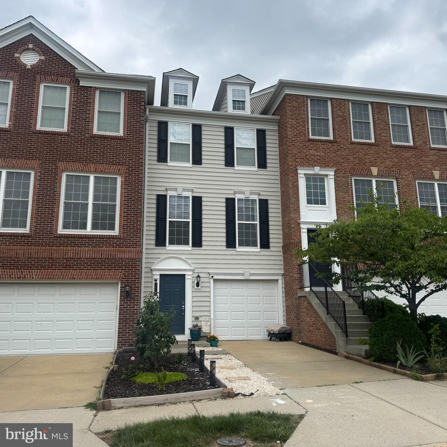 Welcome home to this beautiful 1-car garage fee simple ownership (no condo fees) townhome with 1-car garage in the conveniently located & desirable Windermere community! This home has been tastefully designed with neutral paint & upgraded LVP flooring throughout! The main level living space includes a large living room, dining area & spacious kitchen w/ upgraded appliance & ample cabinet space. The upper level features three spacious bedrooms and full bathroom with upgraded tile. The lower level has a half bath, laundry and recreation room with access to the rear patio overlooking the fenced rear yard. One car garage with 240V plug ready for an EV charger! Other upgrades/updates include dryer (2025), tankless water heater (2022), roof (2021), air conditioning (2021), surge protector in the panel box & much more! Incredible location with tons of guest parking, nearby schools, shopping, dining, commuter routes & entertainment. Photos will be posted on Saturday!