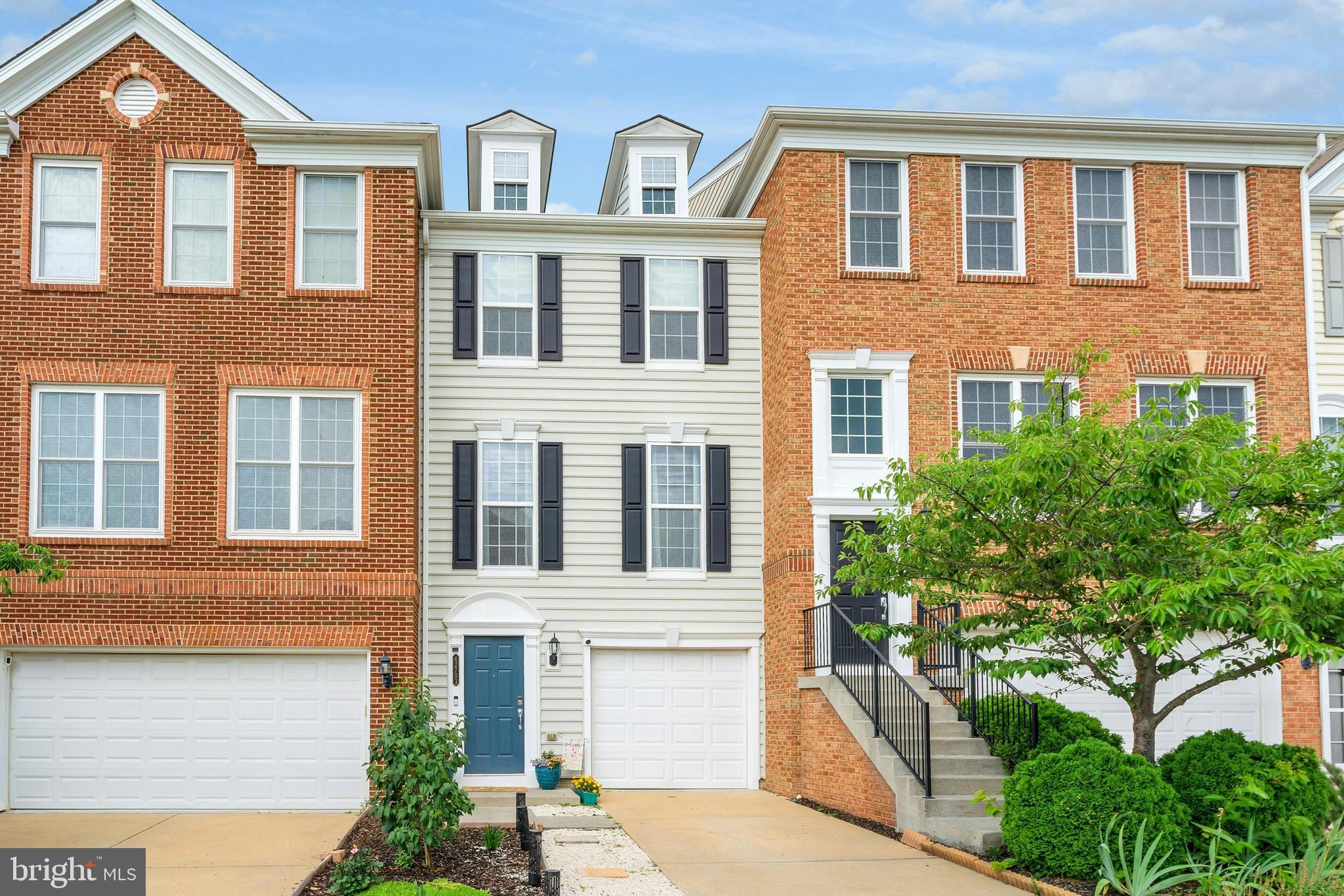 Welcome home to this beautiful 1-car garage fee simple ownership (no condo fees) townhome with 1-car garage in the conveniently located & desirable Windermere community! This home has been tastefully designed with neutral paint & upgraded LVP flooring throughout! The main level living space includes a large living room, dining area & spacious kitchen w/ upgraded appliance & ample cabinet space. The upper level features three spacious bedrooms and full bathroom with upgraded tile. The lower level has a half bath, laundry and recreation room with access to the rear patio overlooking the fenced rear yard. One car garage with 240V plug ready for an EV charger! Other upgrades/updates include dryer (2025), tankless water heater (2022), roof (2021), air conditioning (2021), surge protector in the panel box & much more! Incredible location with tons of guest parking, nearby schools, shopping, dining, commuter routes & entertainment.