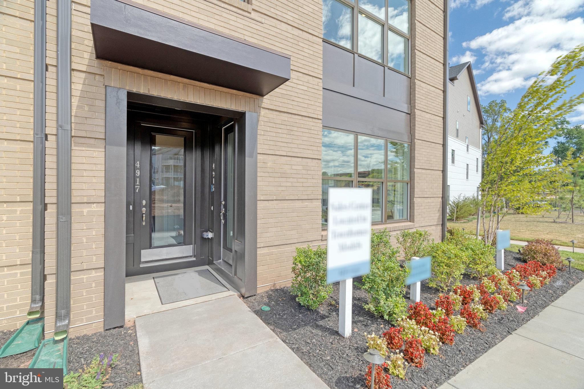 BY APPOINTMENT ONLY***EARLY 2025 MOVE-IN*** These charming stacked townhome style condominiums feature the perfect floorplan for easy living. This home includes a one car garage and paved driveway.  You'll love the sizeable, gourmet kitchen in this home with island and pendants above, ceramic backsplash, upgraded stainless steel appliances  and quartz countertops with upgrade cabinets.  The kitchen and great room areas include luxury vinyl plank flooring. Plus spacious bedrooms on 2nd level of this home also with Luxury Vinyl Plank flooring. This floorplan has a large primary bedroom that includes luxury vinyl plank flooring,  2 walk-in closets and an ultra spa upgraded bath with double sink., upgrade ceramic floors, upgrade cabinets and quartz countertops.*** The Boulevards at Westfields is a new 2-story condominium and townhome community located in the heart of Fairfax, VA. Walk to the nearby 650 Eleanor C. Lawrence Park, with walking trails, sports fields, picnic areas and much more. Excellent commuting via Route 28 to Rt. 50 and Rt. 66; plus just about 10 miles to Dulles International Airport. Prices and terms subject to change. PHOTOS REPRESENTATIVE ONLY; SHOWING OPTIONS AND/OR DECORATOR ENHANCEMENTS OF THE MODEL HOME.