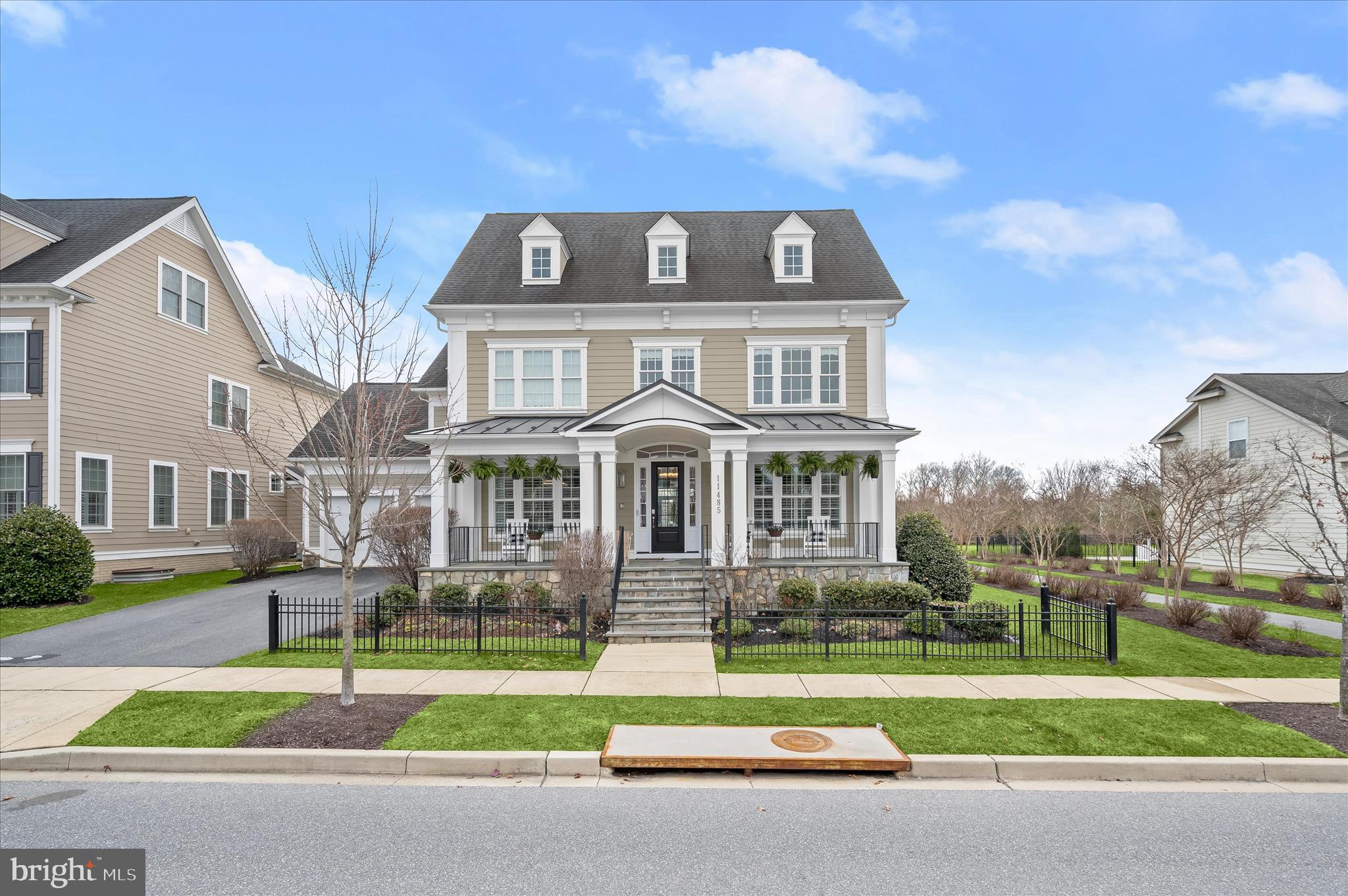 It’s not often that a home this extraordinary presents itself in Maple Lawn. This showpiece property in Maple Lawn’s Midtown-West District built by renowned luxury builder Mitchell & Best features the Hamilton II floor plan with a full-width front porch and completely built-out fourth level. Intentional improvements and thoughtful updates manifest in a new level of glamour and grandeur throughout this 5-bedroom, 5.5 bathroom property offering nearly 7,000 square feet of refined living space. Upgrades include a spa-level sauna, golf simulator, and wine room - and that’s just the lower level. Main level highlights include wide-plank hardwood flooring, elevated moldings and millwork, plantation shutters, and a magazine-worthy designer kitchen. Impressive outdoor elements include a custom stone patio with fire pit, pergola, and water feature - all backing to one of the community’s coveted open spaces. Listed and under contract simultaneously.