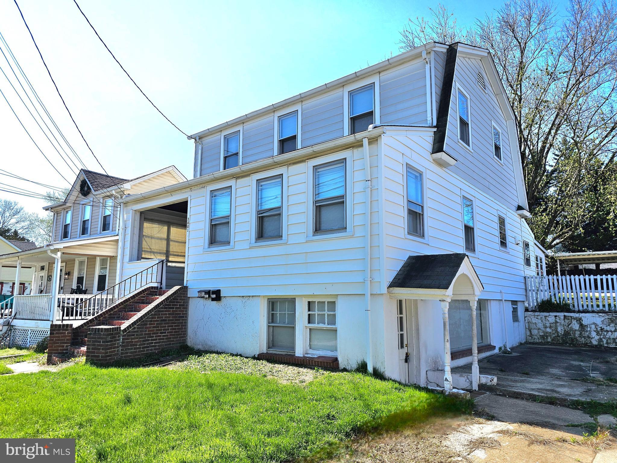 Disclaimer: Actual property is unfurnished. Some images have been virtually staged for illustrative purposes, including the exterior front view of the house.
A lot of space for you: Two spacious living rooms, one on each 1 st and 2nd floor, the living room on the 2nd floor can easily be set up as another room. 4 bedrooms and 3 full bathrooms, including two master bedrooms (one on each floor).  High rised front porch. The "power room " connects to the screen room at the back of the house.  A fully finished side room with seperate entance can be a perfect rental unit for extra income. Brand new kitchen and bathrooms, new HVAC system. Large backyard with long driveway and extra parking lot.
