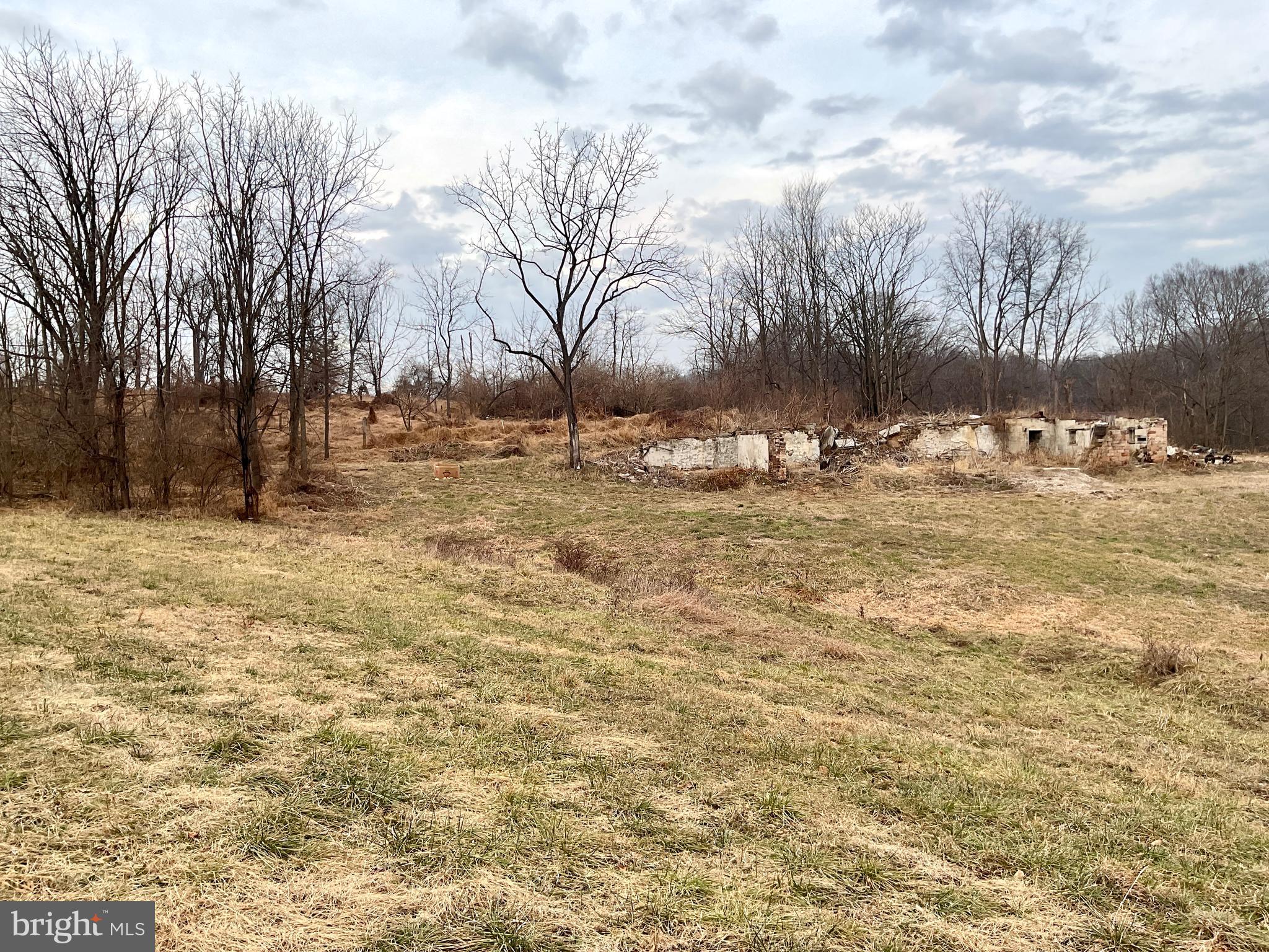 This property is going to onsite auction 3/27/2026 at 1:00 PM and is being sold with reserve. LISTED PRICE IS ONLY A SUGGESTED OPENING BID AND IS NOT INDICATIVE OF THE FINAL SALES PRICE WHICH WILL BE BY SELLER CONFIRMATION DAY OF AUCTION.  Terms: Down payment of $100,000 required day of auction. Settlement on or before May 22, 2026. Transfer taxes to be paid by buyer. Real Estate taxes shall be prorated.
This auction will be held under tent off Crest Rd., by New Haven School w/parking at New Haven Mennonite Church. Be sure to check this 83.89-acre Lancaster Farmland Trust preserved farm being offered in Elizabeth Township. The farm has lots potential with 51 +/- tillable acres, woods, frontage on 3 roads nice 3-car sandstone garage w/ bell tower and a 4-bedroom sandstone house needing work. Rare opportunity to purchase a farm in the Lititz area. Don't overlook this diamond in the rough. Buyer granted access to all fields before settlement.