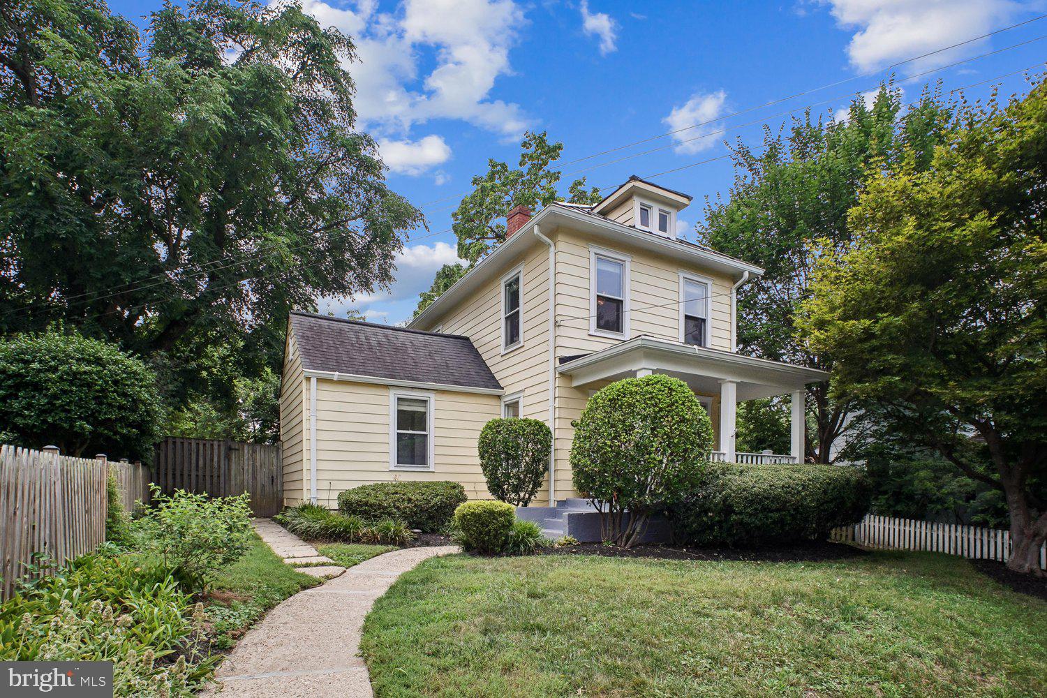 Set on a peaceful, tree-lined street in Arlington's cherished Maywood Historic District, 3610 22nd Street North offers an exceptional blend of historic character and modern comfort. Meticulously renovated and impeccably maintained, this inviting residence reflects the quality and craftsmanship that define one of Arlington's oldest and most beloved neighborhoods. Maywood is celebrated for its architecturally distinctive homes, mature tree canopy, welcoming front porches, and enduring sense of community.

A gracious front porch sets the tone, welcoming you into thoughtfully designed interiors where classic architectural details blend seamlessly with tasteful modern updates. Freshly painted interiors and front porch, designer lighting, beautifully refinished hardwood floors, and expansive windows fill the home with abundant natural light, creating bright and inviting living spaces throughout.

The updated kitchen is thoughtfully designed with modern stainless steel appliances, generous cabinetry, and exceptional storage to accommodate everything from everyday essentials to specialized cookware and culinary equipment. Beautifully renovated full baths feature timeless finishes that complement the home's classic appeal.

The main level offers exceptional flexibility with a spacious bedroom that can also serve as a private home office, complemented by a beautifully updated full bath. Upstairs, two comfortable bedrooms are served by a tastefully renovated full hall bathroom.

The bright and welcoming living room serves as the heart of the home, offering an inviting setting for everyday living and effortless entertaining. The highly functional lower level features dedicated laundry and utility areas along with abundant storage.

Just off the kitchen, a rear entrance leads to the renovated and climate controlled detached garage, offering secure enclosed parking or flexible space for a home office, fitness studio, workshop, or art studio. Beyond, the expansive, level backyard provides an exceptional setting for entertaining, gardening, outdoor recreation, or simply unwinding in a private outdoor setting.

Perfectly situated near neighborhood parks, local restaurants, cafés, shopping, grocery stores, and everyday conveniences, this exceptional home also offers easy access to major commuter routes into Washington, D.C., delivering the ideal balance of historic charm, modern updates, and everyday convenience.