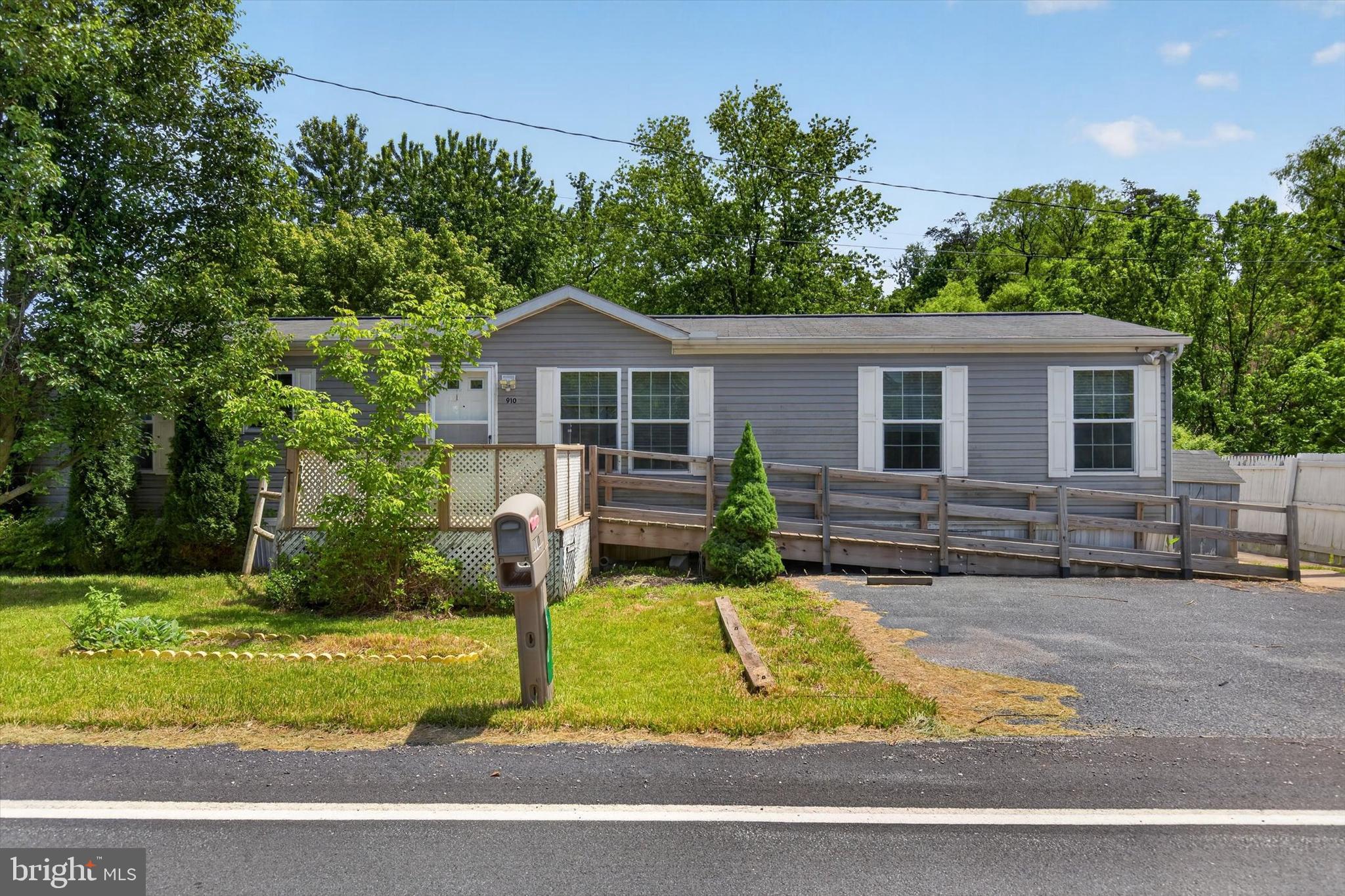 Welcome to 910 Pines Rd, where affordable homeownership meets comfort and convenience! Situated on just over a quarter acre of land, this well-maintained manufactured home is being sold with the land included—meaning no ground rent and the freedom of owning your own property.
Inside, you'll find a bright and inviting open floor plan featuring vaulted ceilings and durable vinyl flooring throughout the main living areas. The spacious layout seamlessly connects the living room, dining area, and kitchen, creating an ideal space for both everyday living and entertaining.  
This home offers 2 bedrooms and 2 full bathrooms, providing flexibility for guests, a home office, or comfortable single-level living. Additional features include central air conditioning for year-round comfort and in-home laundry for added convenience.
Outside, enjoy the extra space that comes with a generously sized lot, offering plenty of room for gardening, outdoor activities, or simply relaxing. Two storage sheds provide ample space for tools, lawn equipment, and seasonal items.  Close to 83 for an easy commute to York or Harrisburg.