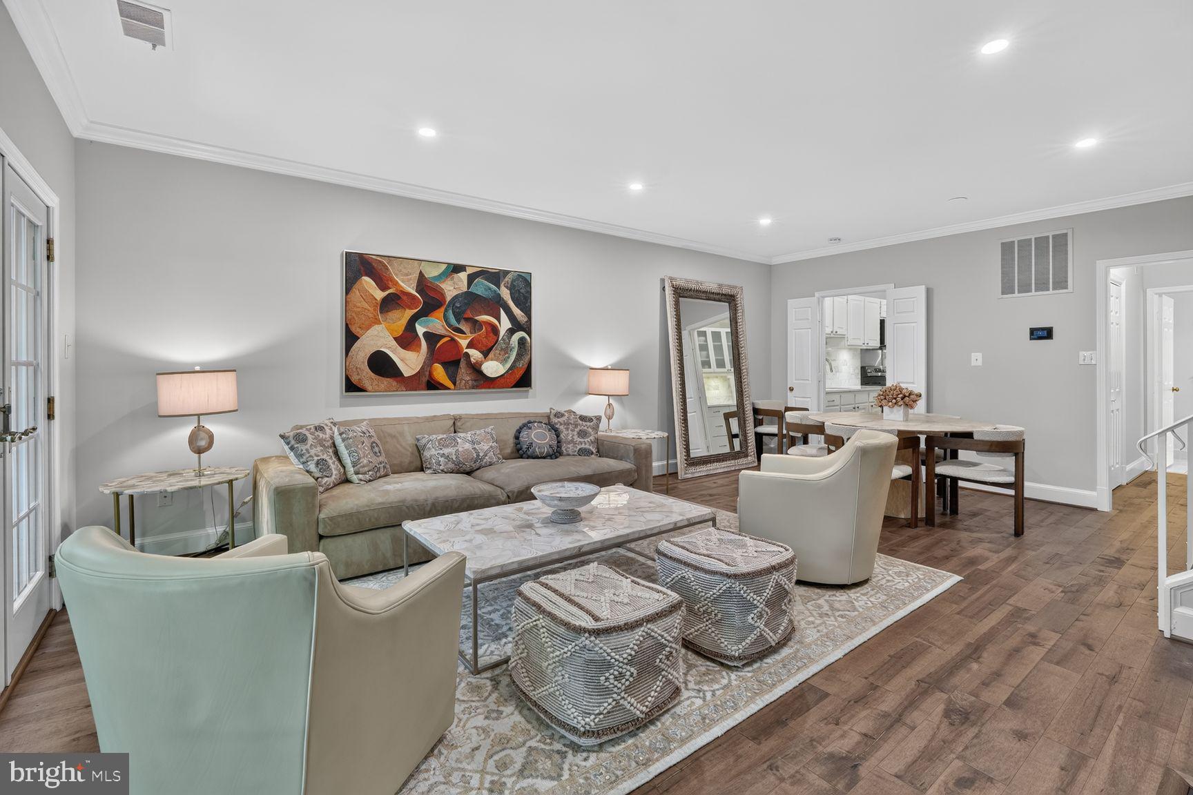 ** Open House Saturday, 06/27 from 11:30am to 1:30pm ** 3271 Sutton Place has been tastefully updated and meticulously maintained by the current owners.  With its eastern and western exposures, the unit is full of natural light throughout.  The living room has a fireplace surrounded by built-ins, lovely wood flooring and sliding doors to a spacious patio where large trees provide plenty of shade to keep you cool even during DC summers.  The kitchen has been updated to include a Bosch dishwasher, marble subway tile backsplash, a coffee station and ample cabinet space.  There is also a powder room and laundry closet on this level.  Crown moldings throughout this level add a touch of elegance to each room.  The bedroom level includes an entry foyer with a large coat closet, a primary bedroom with a wall of custom closets, and a full bath. The guest bedroom is spacious and has an adjoining hall bath.  Sutton Place owners enjoy access to an outdoor pool, tennis courts, ample guest parking (in addition to 2 spaces provided with the unit), beautifully landscaped grounds and a front gatehouse to announce guests and deliveries.