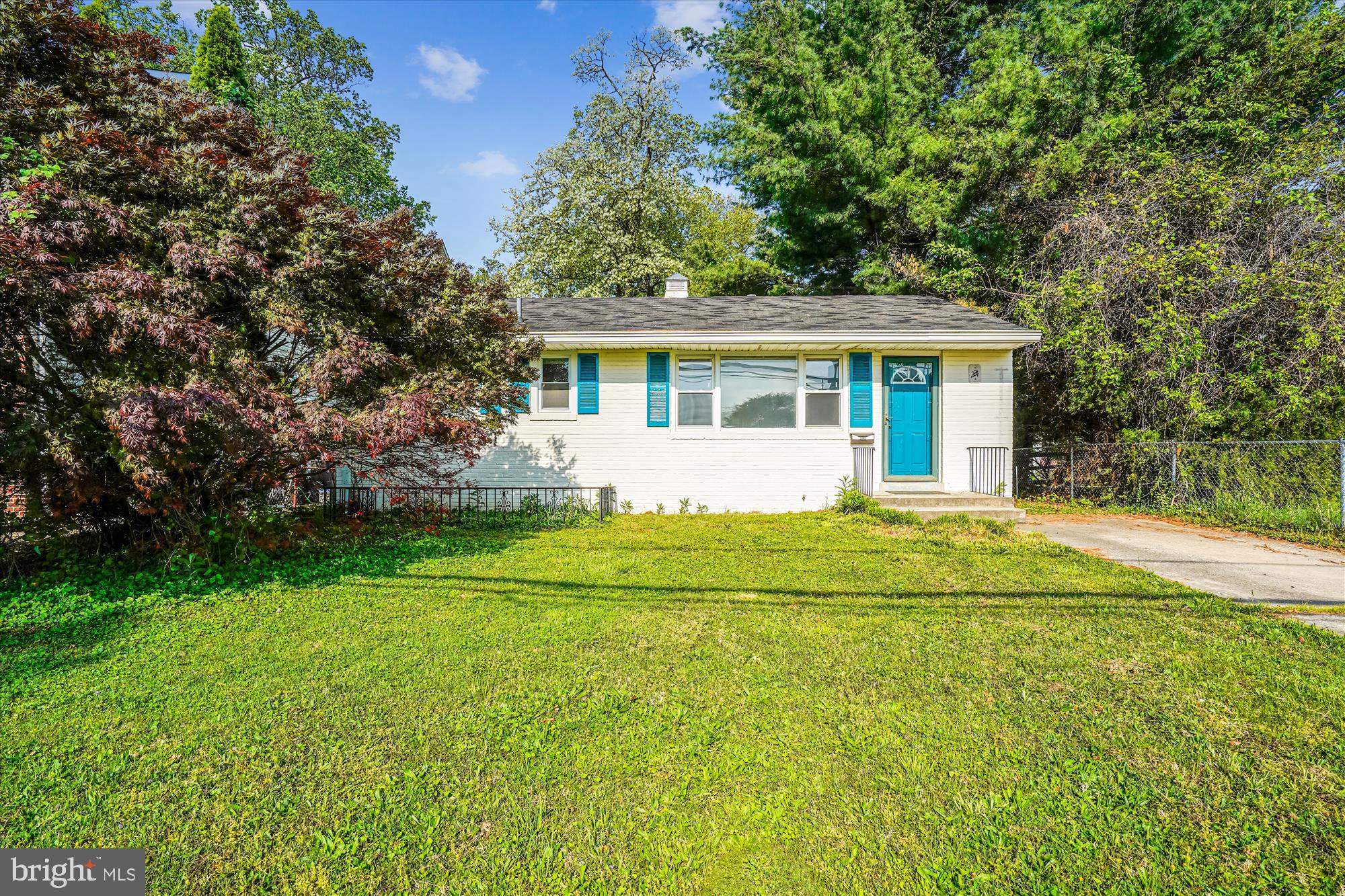 Open house this Saturday, 5/17 from 12-1pm!  All showings for the weekend will be conducted at this time. This home is located just blocks to all the wonderful restaurants, shops, movie theaters and so much more that Rockville Town Center has to offer, including the Red Line Metro! Settle in to this three bedroom, one and a half bath home and enjoy the quiet, ease, and comfort of suburban life with urban amenities. Laminate floors in Living Room, hallway and all three Bedrooms. Sliding glass doors from the Kitchen and Bedroom walkout to the deck and huge rear yard. Driveway parking for your own car. READY TO MOVE IN. No pets permitted. Landlords prefer 24 month lease.
