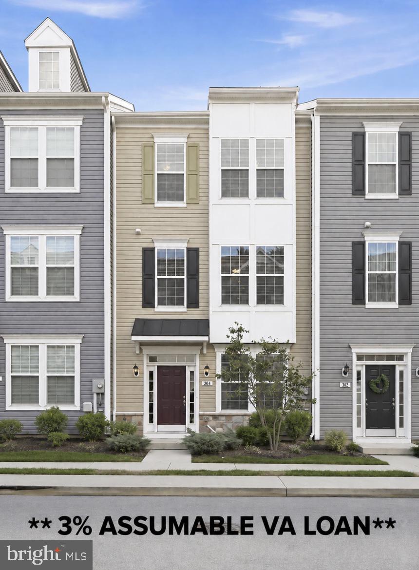 **3% Assumable VA LOAN**Open House Sunday 1-3pm**Welcome to this stunning, light-filled contemporary townhome built in 2021 and located in the highly desirable Spring Bank community of Frederick. Offering over 2,000 square feet of beautifully finished living space, this spacious home features 4 bedrooms, 3.5 bathrooms, a 2-car rear-entry garage, and modern upgrades throughout.

The entry level includes a versatile bedroom or private home office with an adjacent full bath — perfect for guests, remote work, or additional living space. Upstairs, the open-concept main level showcases luxury vinyl plank flooring, oversized windows, and an impressive chef-inspired kitchen complete with an expansive center island, quartz countertops, espresso cabinetry, stainless steel appliances, gas cooking, pantry, and stylish designer lighting. The spacious living and dining areas flow seamlessly and are ideal for entertaining or everyday living.

Retreat to the upper level owner’s suite featuring tray ceilings, abundant natural light, a walk-in closet, and a spa-like bath with dual vanities and an oversized glass shower. Two additional bedrooms, a full hall bath, and convenient upper-level laundry complete the bedroom level.

Additional highlights include ceiling fans throughout, contemporary finishes, ample storage, and a generously sized garage with additional parking nearby. Conveniently located near Clemson Corner, Wegmans, Market Square, downtown Frederick, shopping, dining, parks, and major commuter routes. This exceptional home offers the perfect blend of style, comfort, and convenience in one of Frederick’s most sought-after communities.  Mortgage Balance appx $317k  **All Offers Due Tuesday June 23rd @12noon**