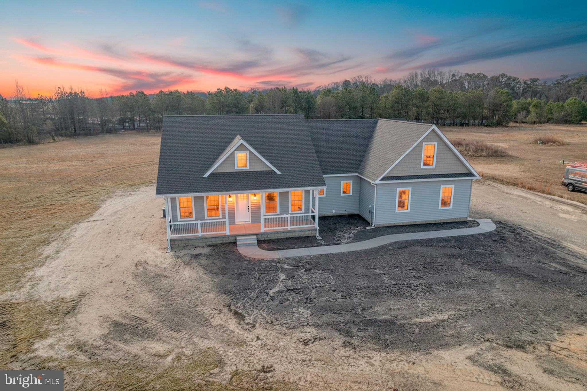 Welcome to this beautiful new construction home offering the perfect blend of modern finishes and functional design on a spacious 1.16 acre lot!
Located at 3150 Old Sharptown Rd, Laurel, DE 19956, this 3 bedroom, 2.5 bathroom home features 1,886 square feet of thoughtfully designed living space.
Step onto the inviting front porch and into an open, split floor plan highlighted by luxury vinyl plank flooring, granite countertops, stainless steel appliances, and stylish modern light fixtures throughout. The spacious layout provides both comfort and privacy, ideal for everyday living and entertaining.
The primary suite is a true retreat, complete with a walk in closet and a beautifully appointed bathroom featuring a tile shower and double vanities. A large laundry room adds convenience, while additional unfinished spaces offer incredible flexibility perfect for storage, a home office, or future expansion.
Upstairs, an unfinished room presents the opportunity for a 4th bedroom or bonus space, allowing you to customize the home to fit your needs.
Enjoy peaceful country living with plenty of room to spread out, all while being just a short drive to nearby amenities.
Offered at $529,900 don't miss your chance to make this stunning home yours!