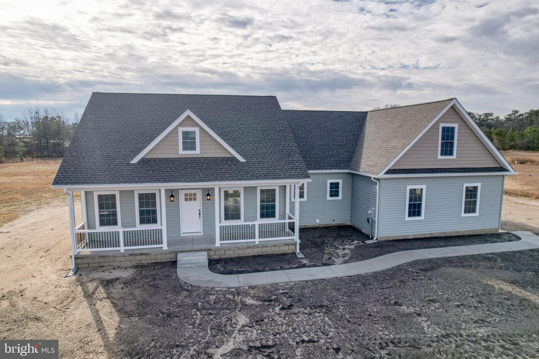 Welcome to this beautiful new construction home offering the perfect blend of modern finishes and functional design on a spacious 1.16 acre lot!
Located at 3150 Old Sharptown Rd, Laurel, DE 19956, this 3 bedroom, 2.5 bathroom home features 1,886 square feet of thoughtfully designed living space.
Step onto the inviting front porch and into an open, split floor plan highlighted by luxury vinyl plank flooring, granite countertops, stainless steel appliances, and stylish modern light fixtures throughout. The spacious layout provides both comfort and privacy, ideal for everyday living and entertaining.
The primary suite is a true retreat, complete with a walk in closet and a beautifully appointed bathroom featuring a tile shower and double vanities. A large laundry room adds convenience, while additional unfinished spaces offer incredible flexibility perfect for storage, a home office, or future expansion.
Upstairs, an unfinished room presents the opportunity for a 4th bedroom or bonus space, allowing you to customize the home to fit your needs.
Enjoy peaceful country living with plenty of room to spread out, all while being just a short drive to nearby amenities.
Offered at $529,900 don't miss your chance to make this stunning home yours!
