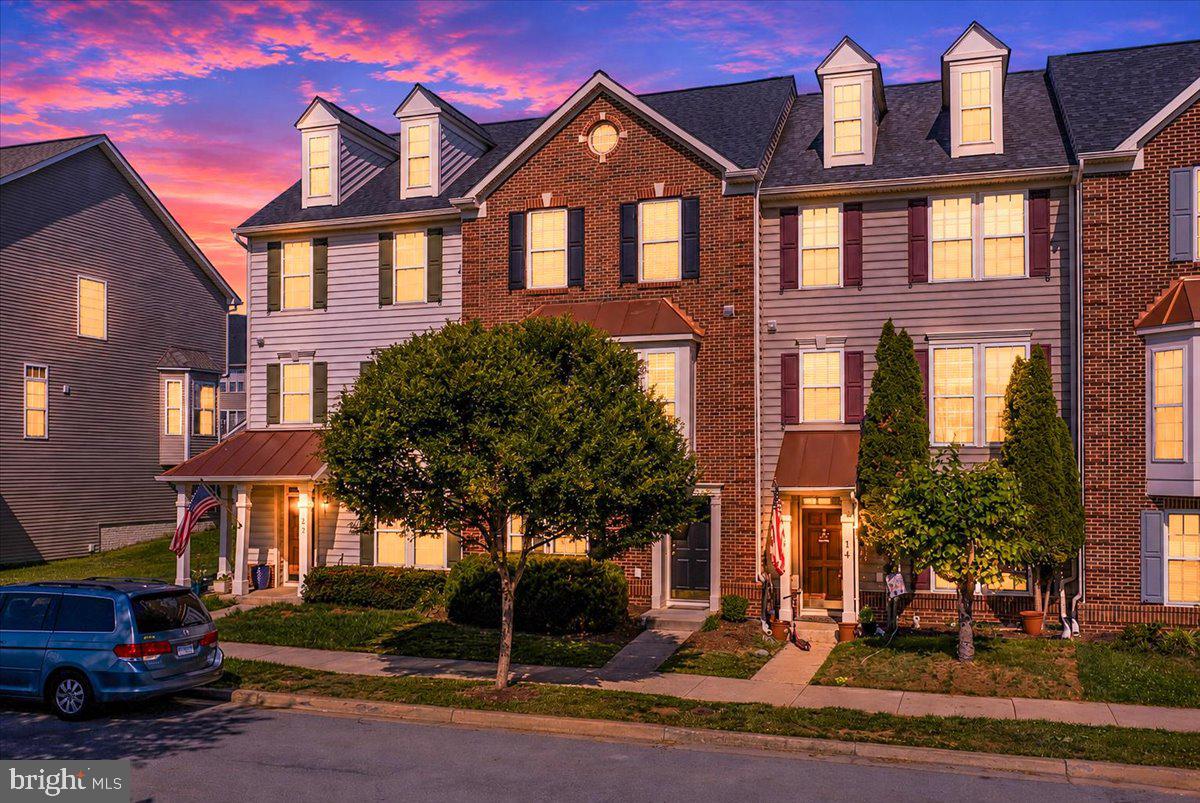 Absolutely fantastic, clean, townhome in Huntfield, one of Jefferson County's planned communities with pool (coming soon), tot lots, playgrounds, basketball, tennis, walking paths and more seconds from Route 340.   Situated just around the bend from Washington High School, this property is poised for ease and an amenity rich lifestyle.  This is the largest model offered by Ryan Homes featuring a full 12 foot bump out on the rear and a 2 foot box bay window on the brick front.  This bump out features a gas fireplace on the main level, creating a fantastic sun filled area for eating, gathering, and entertaining.  The kitchen is newly appointed with Granite countertops, upgraded appliances, and center island.  The fully finished lower level adds a private play space for kids and adults alike.  With the 12 foot bump out on the rear, this is an expansive basement and features a front room to be used as an additional bedroom or convenient office.  On the upper level, you will find a huge primary suite with vaulted ceilings, large walk in closet, and luxurious bathroom.  There are two other bedrooms upstairs in the front of the home.  The fenced rear yard leads to your one car detached garage and driveway space allowing for additional parking, play space or just room to move.