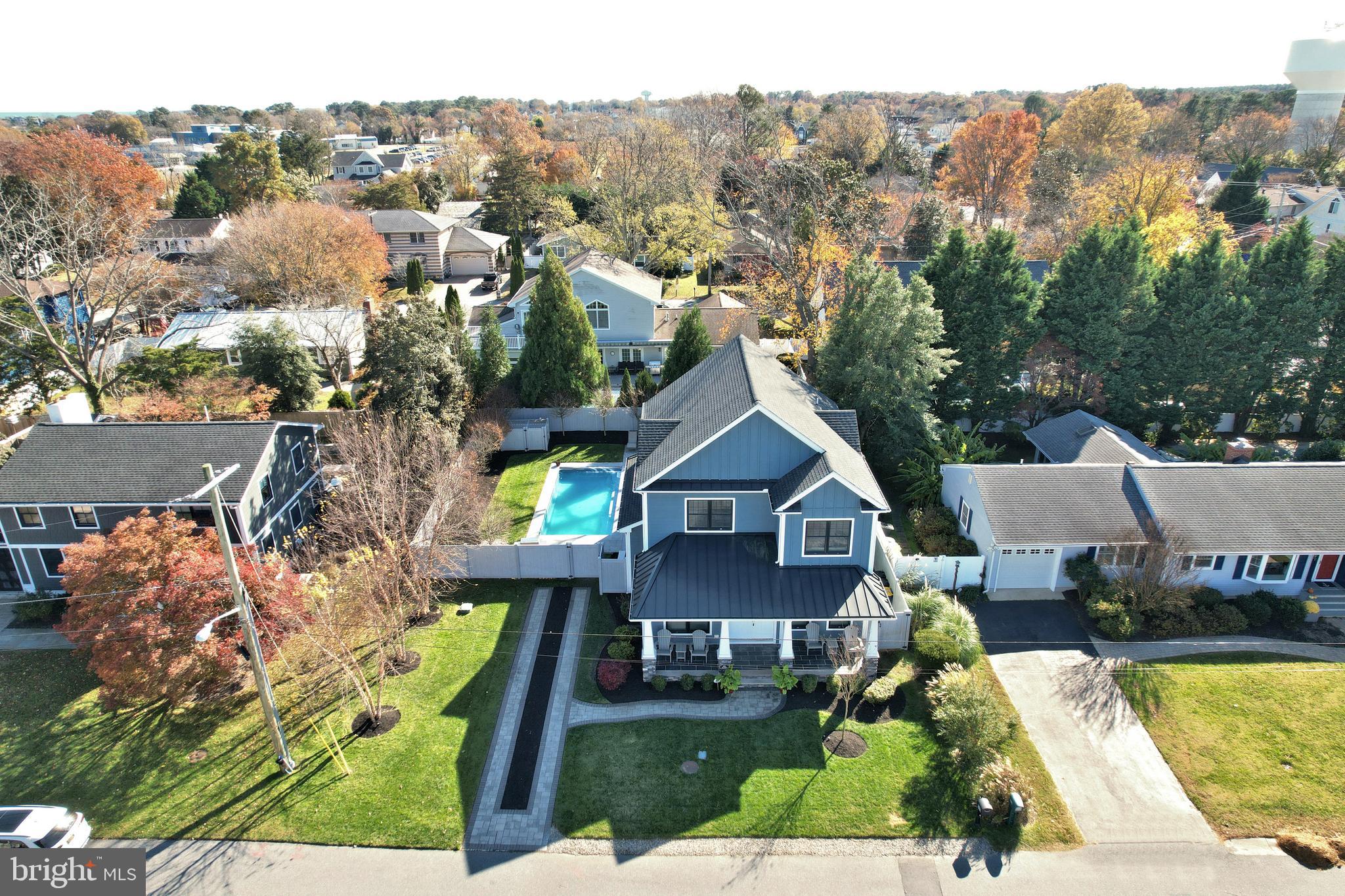 Welcome to this beautifully maintained smart home built in 2019 on a 75 x 100 lot that blends timeless charm with contemporary convenience. From the moment you step inside, you’re greeted by an inviting open layout filled with natural light and stylish finishes throughout. Offering 4 bedrooms, 4.5 baths, separate office as well as a finished basement. 
The spacious living area flows seamlessly into a modern Chef’s Gourmet kitchen featuring sleek countertops, Wolfe appliances, and ample storage to include a walk-in pantry with an additional refrigerator—perfect for everyday living or entertaining guests. Four generously sized bedrooms with custom closets offer comfort and privacy, while the custom bathrooms provide a spa-like feel.
Step outside to a private backyard oasis ideal for relaxing, gardening, or hosting gatherings with irrigation. With a 30 x 14 saltwater heated pool, mature landscaping, a cozy patio, outdoor shower, and plenty of space to enjoy, it’s your own retreat at home.
Located in a desirable neighborhood close to beaches, parks, shopping and dining, this home offers both convenience and a serene lifestyle. Whether you're an investor, growing household, or simply looking for a fresh start, this property is ready to welcome you.