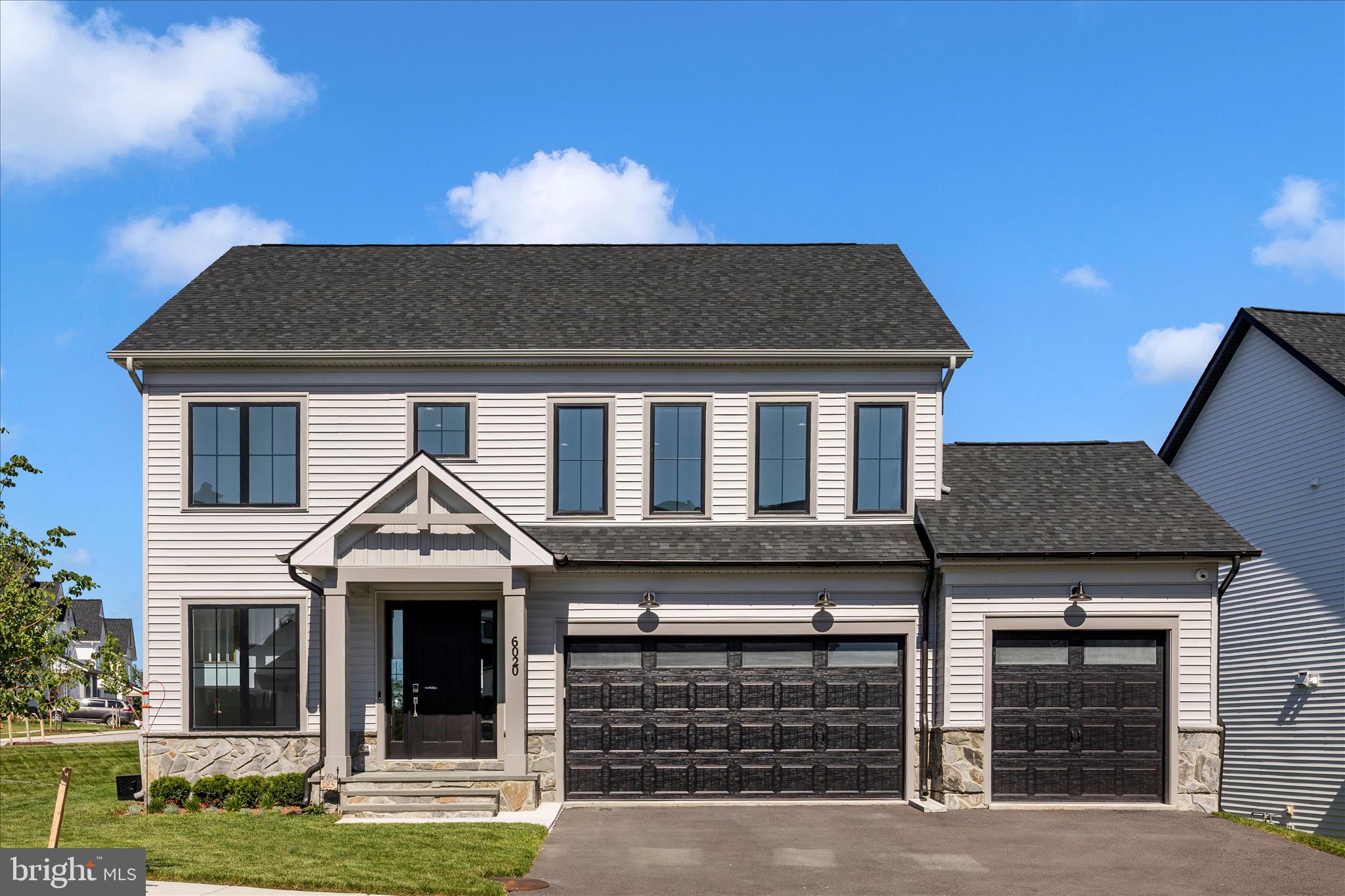 Welcome to 6020 Duvalls Forest Drive, a beautifully upgraded, Wormald home located in The Estates at Rosehaven Manor. Perfectly situated on a desirable corner lot with no city taxes, this exceptional property offers over 4,000 total square feet, 5 bedrooms, 3 full bathrooms, 1 powder room, and a 3-car garage.
From the moment you enter, you will notice that every detail was thoughtfully selected, including upgraded flooring, abundant windows, recessed lighting packages, and a bright, open layout designed for both everyday living and entertaining. The main level features a formal dining area, private office, and a convenient main-level bedroom with an adjoining full bathroom — perfect for guests, multi-generational living, or flexible use.
The heart of the home is the stunning gourmet kitchen, complete with quartz countertops, stainless steel appliances, breakfast bar, gas cooktop, stainless hood, and beautiful finishes throughout. The kitchen opens to the spacious family room, highlighted by a designer gas fireplace and access to the fantastic screened-in porch with ceiling fan, offering the perfect place to relax and enjoy the backyard.
Upstairs, the floor plan was customized to include a wonderful loft/second family room area, creating even more flexible living space. The spacious owner’s suite features a tray ceiling and an adjoining luxury bathroom with dual vanities, designer tile shower, and private water closet. Two well-appointed secondary bedrooms, a hall bathroom, and an upper-level laundry room complete this level.
The finished lower level offers even more space with a large recreation area, an additional bedroom currently being used as a home gym, and a full bathroom — ideal for guests, entertaining, fitness, hobbies, or extended living. The basement also walks up to the backyard.
All of this is just 3.5 miles from everything Downtown Frederick has to offer, including restaurants, breweries, distilleries, shopping, live music, and more. Conveniently located just minutes from major commuter routes while enjoying the benefit of no city taxes. Look no further; you are home.