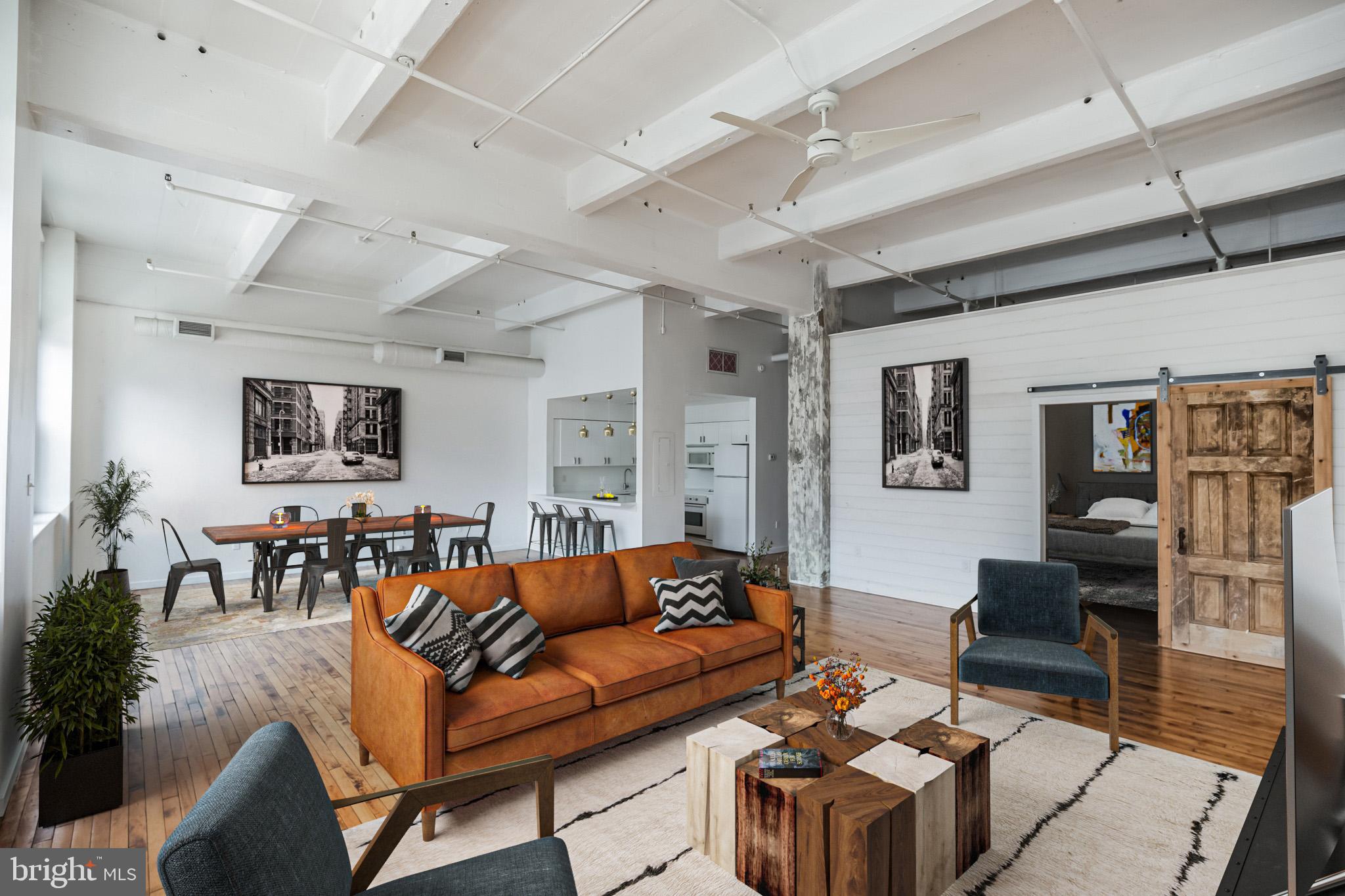 PRICE ADJUSTMENT! Step into the epitome of urban sophistication with this extraordinary industrial loft nestled in the sought-after Beaux Arts Lofts building! This stunning residence has been featured in not one, but two style magazines, and it's not hard to see why.
LOCATION: Discover the allure of living across the street from the iconic Reading Viaduct, providing a unique blend of urban charm and historic significance. The neighborhood boasts an array of delectable dining options, trendy bars, and cozy cafes. With Trader Joe's, Starbucks, and Whole Foods just a stone's throw away, convenience meets luxury. And let's not forget the quick and easy access to all the excitement Center City has to offer.
INTERIOR ELEGANCE: Step through the door into a world of sophistication, highlighted by gorgeous hardwood floors, ceilings reaching a lofty 12'7", and a series of expansive 9' windows adorned with chic solar shades. The kitchen has been tastefully updated with pristine white cabinets, countertops, and three remarkable Alvar Aalto ceiling lights, creating a perfect blend of modern style and functionality.
Practicality meets aesthetics with ample storage solutions, including a full wall of cabinets in the bedroom and rows of shelves in the laundry area, complete with a stackable washer and dryer. The bathroom is a visual feast, showcasing beautiful tiles and sleek concrete floors.
MODERN COMFORTS: No detail has been spared in ensuring modern comfort. Central Air, installed in 2014 by Green Cooling + Heating and serviced just last year, guarantees a cool and comfortable retreat. A brand-new Hot Water Heater, installed this year, adds to the modern amenities ensuring a worry-free lifestyle.
COMMUNITY DELIGHTS: The perks extend beyond the confines of your chic loft. The HOA takes care of water, sewer, trash, and snow removal, granting you the freedom to relish the surroundings. Access to a recently renovated roof deck elevates your living experience, offering the perfect setting for entertaining or enjoying breathtaking city views.
MANAGEMENT EXCELLENCE: Marvel at the freshly painted interiors, enhancing the industrial and modern vibes that define this unique loft. Rave reviews about the property management, especially their meticulous upkeep of common areas and complimentary exterior window washing services, speak to the commitment to excellence in every detail.
Don't miss this opportunity to make this industrial haven your very own. Schedule a viewing and immerse yourself in the allure of this unique urban retreat - a true embodiment of city living at its finest!