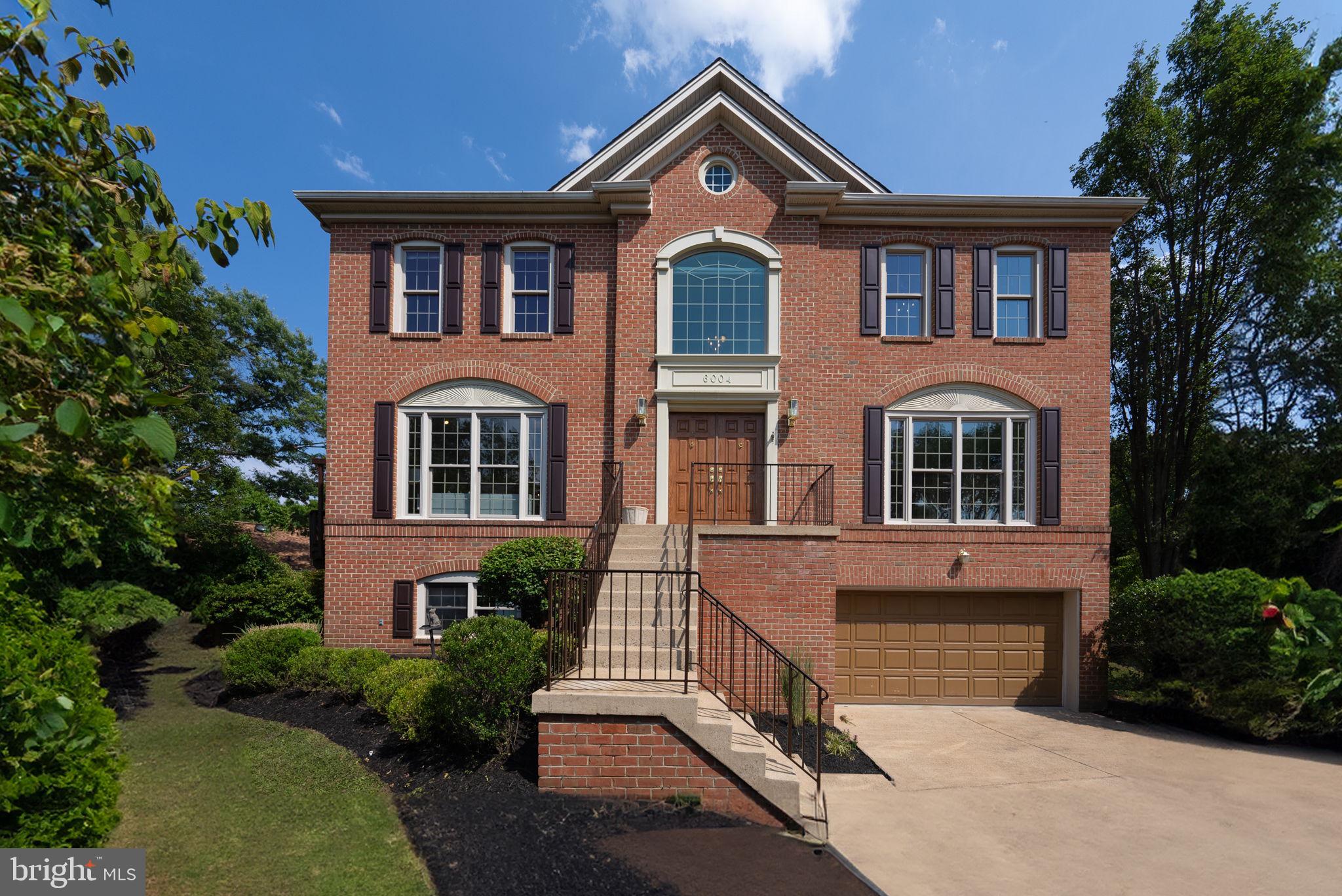 Tucked away in the heart of North Arlington's popular Spy Hill neighborhood, this magnificent 5 bedroom and 3.5 bath residence offers an unparalleled blend of elegance and comfort. As you approach, the cul-de-sac location ensures peace and privacy, while the meticulously landscaped yard provides a serene, picturesque backdrop. Stepping inside, you're greeted by a grand two-story foyer with a dramatic window over the front door where natural light pours in.  
From the foyer, you will see a spacious home office where the centerpiece of the room is the  stunning white built-in desk and cabinets providing storage space for your office essentials. The large windows dominate one wall creating a bright and uplifting environment. 
Experience the charm of the dining room, enhanced by two custom-built white cabinets with elegant glass doors and interior lights to showcase your prized collectibles. The spacious living room, with its second gas fireplace, serves as the stunning focal point of this inviting gathering space.
The family room flow seamlessly into the bright gourmet kitchen, a culinary haven featuring top-of-the-line appliances, freshly painted white cabinets and quartz countertops. The family room is warmed by a gas fireplace during those cold winter nights. French doors lead to a cozy deck perfect for morning coffee or dining under the stars. 
Ascending to the upper level, you'll find four generously proportioned bedrooms, including a lavish owner's suite designed as a personal retreat. The spa-like bath promises relaxation and rejuvenation with its luxurious amenities. The lower level of the home is an entertainer's dream, offering a spacious walk-out family room, a full bathroom and a private au pair suite, perfect for guests or extended family.
The exterior of the home is equally impressive, featuring a two-car garage, a newly stained private. Professional landscaping envelops the property, turning it into a private sanctuary.
Voted as one of the best places to live by Niche®, Boulevard Manor is a charming residential neighborhood known for its picturesque, tree-lined streets offering a cozy suburban feel while still being easily accessible to Westover, Ballston, Washington, DC, The Pentagon and Tysons Corner via the East Falls Church or Ballston Metros or Route 50. 
The vibrant Boulevard Manor Civic Association connects neighbors through its list serve and events like the annual picnic in the park, Easter egg hunt, 4th of July ice cream social and dinner supporting Veterans. Local Bon Air Park, Bluemont Park, WO&D trails and Upton Hills Park provide abundant outdoor attractions to enjoy such as playgrounds, trails, Climb Upton, outdoor pools, frisbee golf, batting cage, tennis courts, baseball field, greenspace, rose gardens, soccer field and miniature golf. Also minutes away are Chick-fill-A, Café Rio and Thai Social, Target, CVS and Home Depot adding to the attractiveness of this neighborhood gem.

Schedule your appointment before another buyer makes this magnificent home their own.