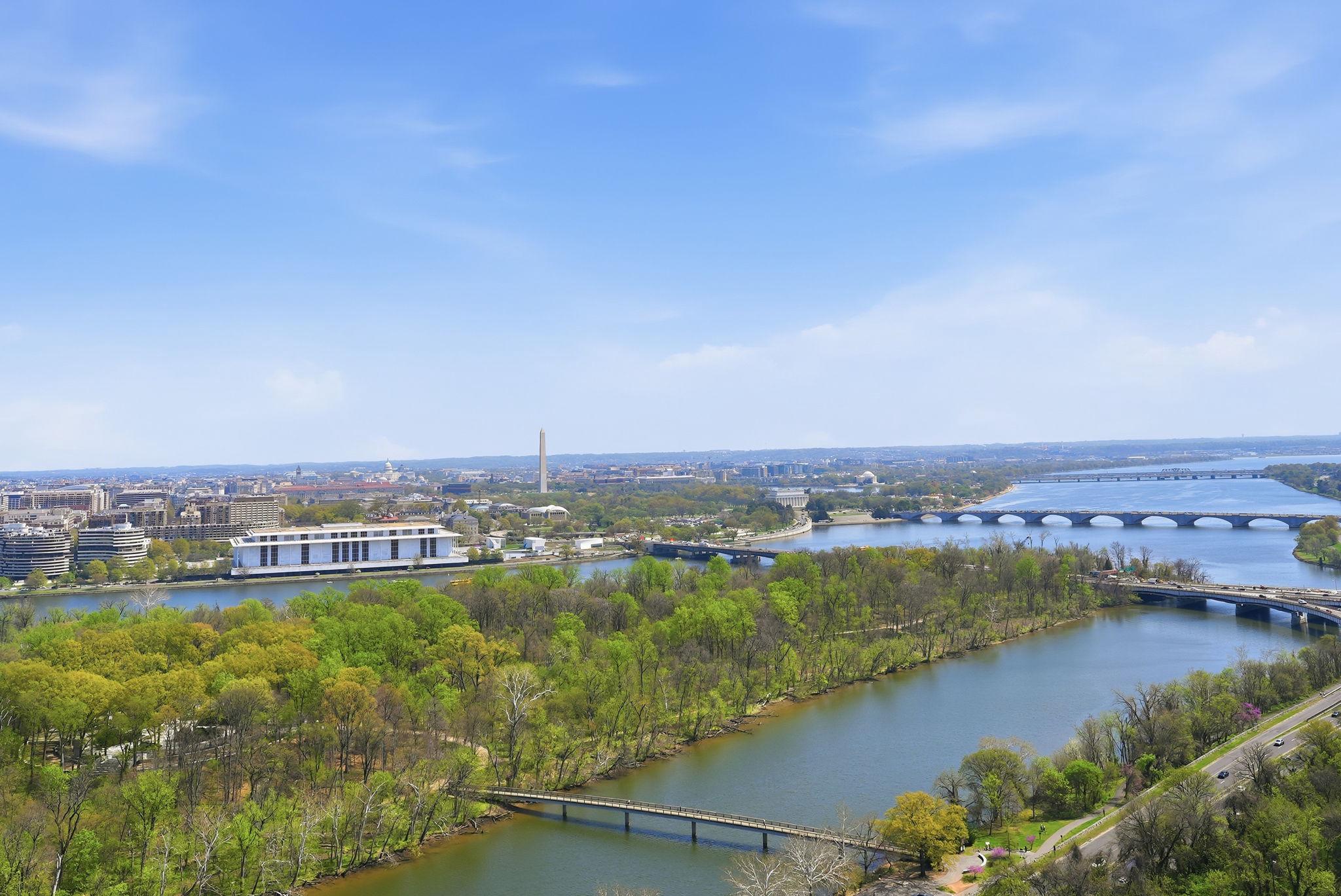 Experience elevated living at The Waterview—a rarely available luxury 2-bedroom corner residence perched on the 26th floor of the iconic Waterview in Arlington. Every room showcases breathtaking, panoramic vistas stretching across the Potomac River, the monuments of Washington, D.C., National Airport, The Pentagon, and the vibrant Rosslyn skyline.

Inside, the home blends modern elegance with comfort. The sleek, contemporary kitchen is outfitted with premium Miele, Sub-Zero, and Viking appliances, designed for both everyday living and sophisticated entertaining. Heated tile floors flow throughout the main living spaces, while the bedrooms offer plush wool carpeting for warmth and tranquility.

Residents enjoy 24-hour security and a friendly concierge, along with exclusive access to the building’s spectacular rooftop terrace featuring approximately 280-degree views spanning the monuments, Georgetown, the airport, and beyond. Entertain in style with the BBQ area, fire pits, lounge seating, and the option to reserve the rooftop for private gatherings.

Unbeatable convenience places you just one block from the Rosslyn Metro Station, surrounded by dining and shopping, and moments from the Francis Scott Key Bridge into Georgetown. One assigned parking space conveys.

This is luxury high-rise living at its most breathtaking—where every window frames a postcard view.
