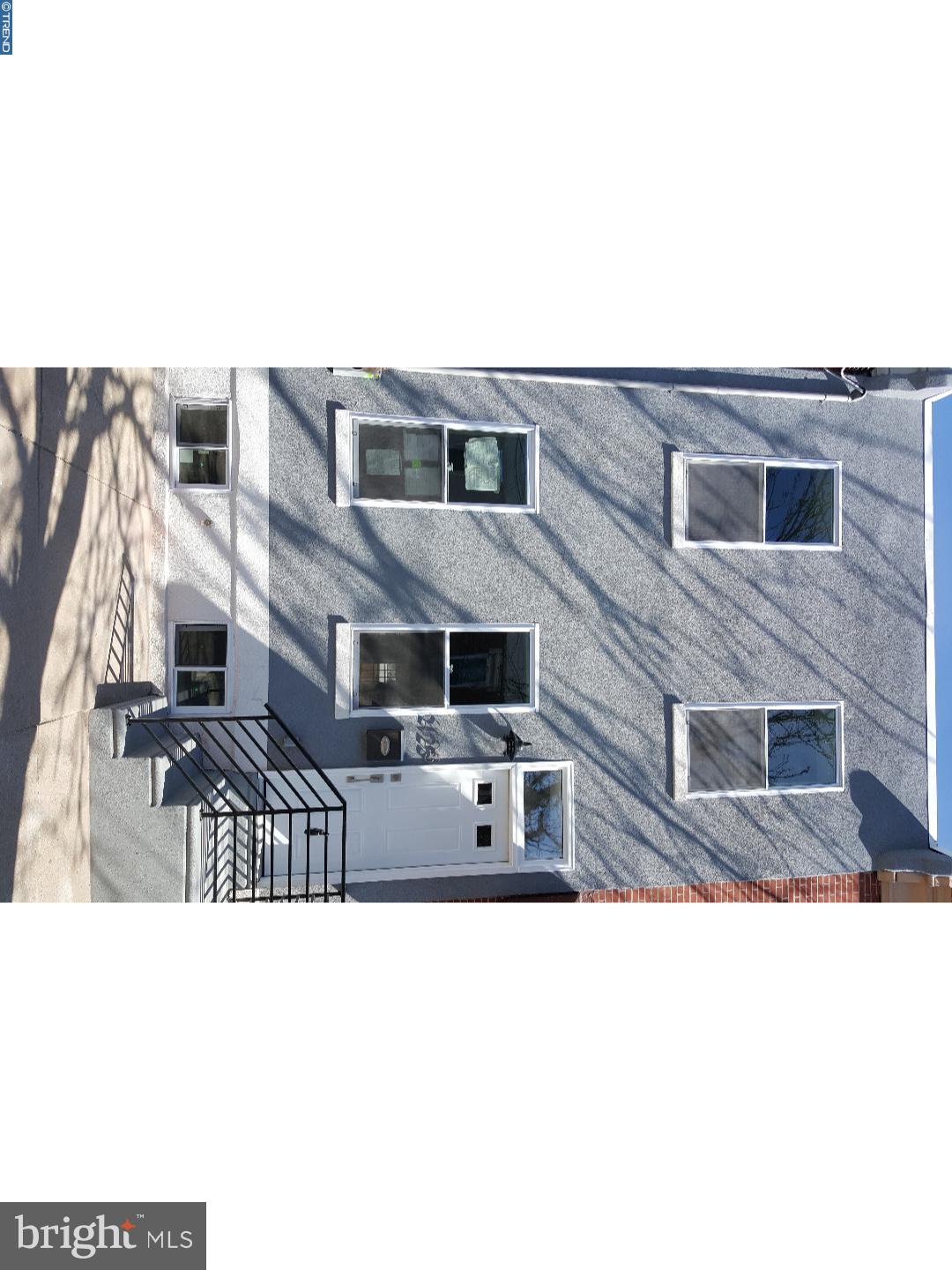 Welcome to this beautiful, newly renovated home located on one of the nicest blocks in Point Breeze!!! No detail has been spared on this home, dont miss out this is the one you've been waiting for!! Enter into an open floor plan with living room, exposed brick wall, dining area, powder room, and nicely flows into the large kitchen. The modern kitchen has shaker style cabinets, beautiful granite countertops, glass backsplash and stainless steel appliances. The large back yard has a privacy fence, new concrete patio, and an ideal space for those who enjoy entertaining outside. The finished basement has porcelain tile flooring and adds to the beauty and spacious feel; this home has over 1,600 sq.ft. of total living space!! The second floor offers two well-appointed and large bedrooms. The master bedroom is truly amazing with huge double closets and a private master bathroom with custom stand up shower!! Everything in the house is brand new from the electrical, plumbing and HVAC systems to the oak hardwood floors throughout!! The front of the home also has a new front. The location is near many great spots that this booming Point Breeze neighborhood has to offer and just a few short blocks to Graduate Hospital! It is also situated on a block which is very wide and easy for parking. You will feel at home the minute you walk in.