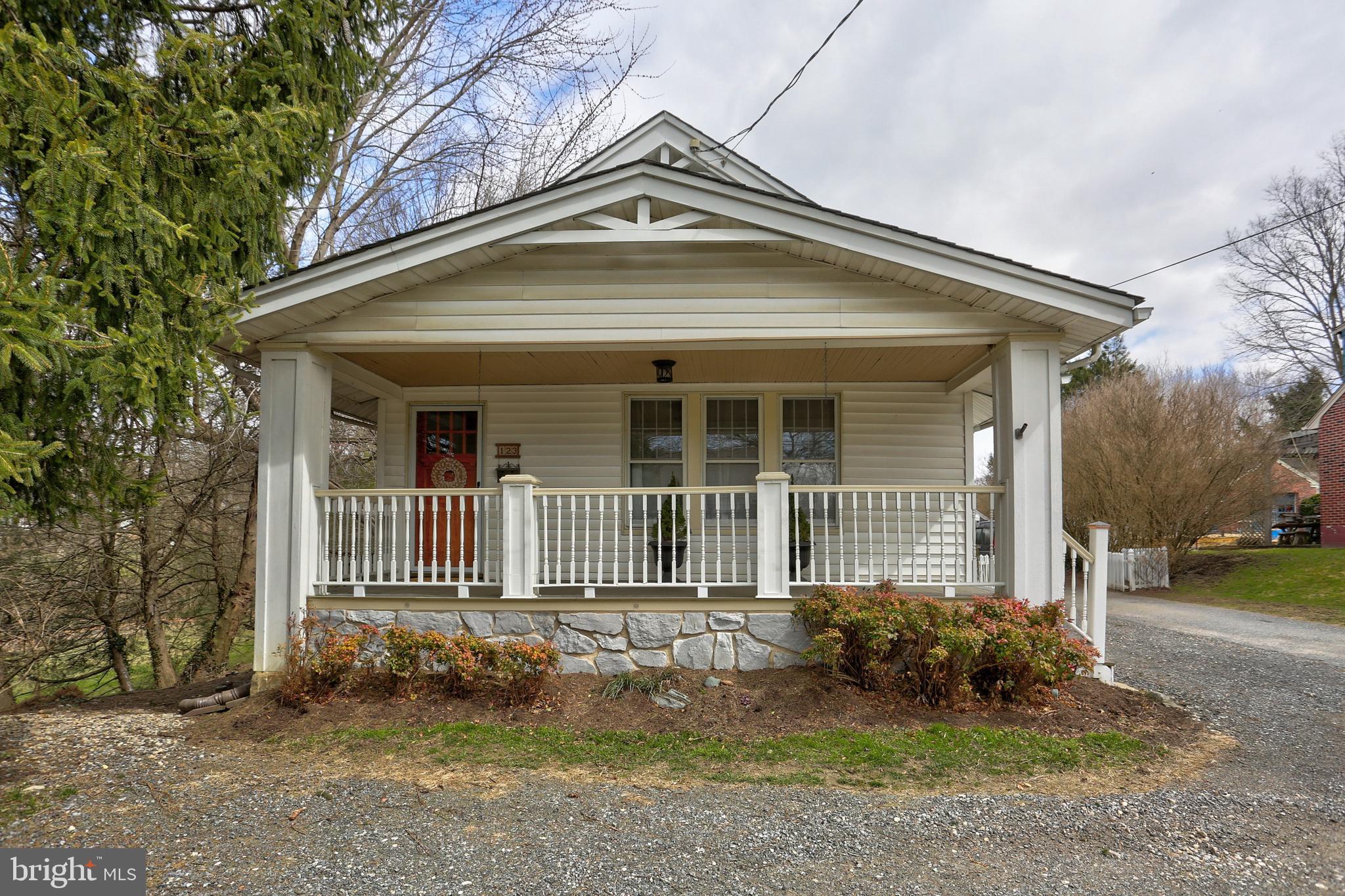 Centrally located with easy access to Lancaster City, this cozy 3-bedroom has charming craftsman trim details. Home features updated kitchen with ceramic tile backsplash, dining room with built in wine rack, exposed brick and attic access in third bedroom, and hardwood floors throughout. Welcoming rear deck with pergola and showpiece outdoor fireplace are perfect for entertaining. Lots of storage within home, garage, and shed.