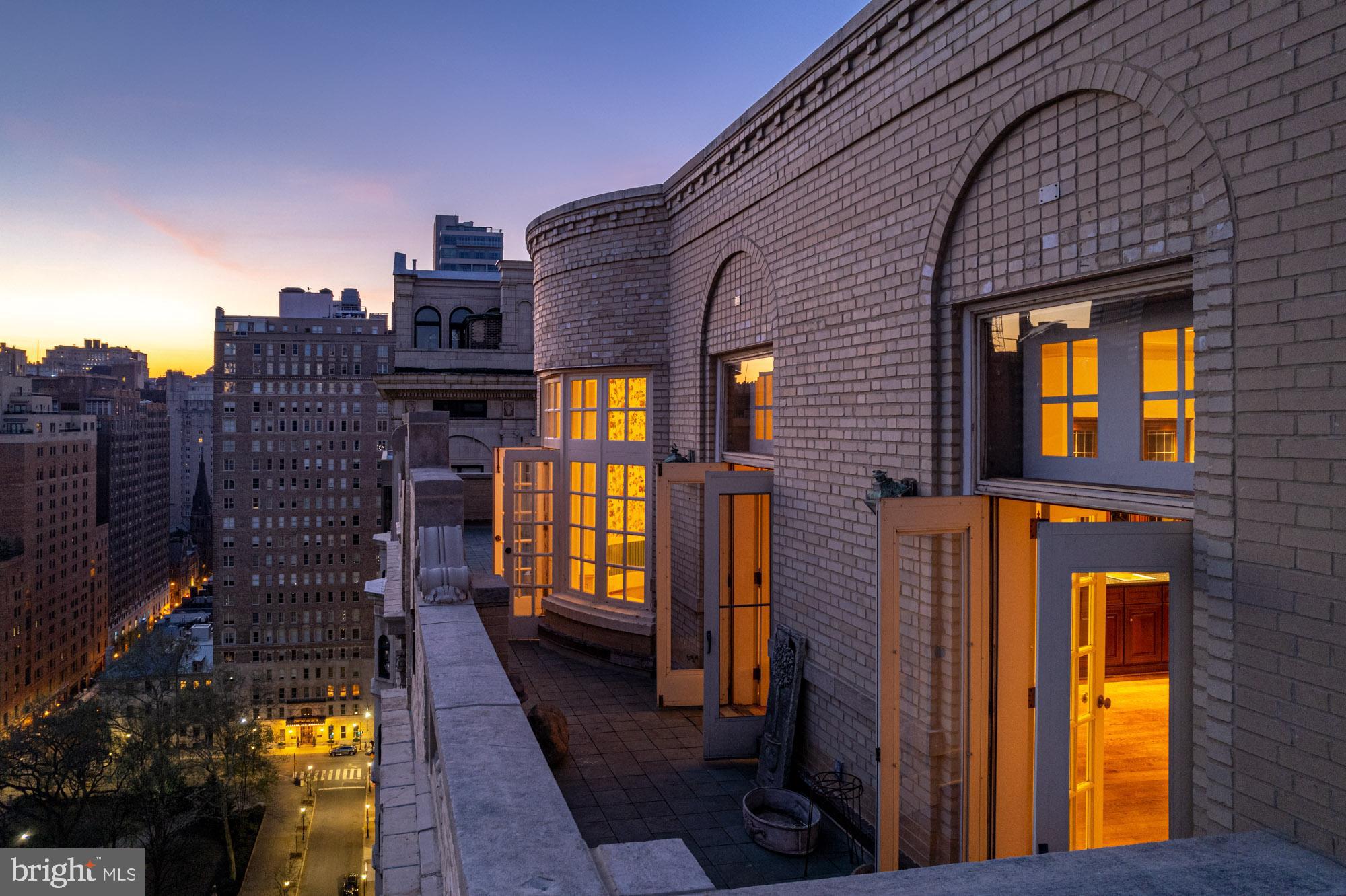Introducing The Crown of Rittenhouse Square, an iconic Philadelphia penthouse where regal parapet-walled terraces deliver unimpeded views over the park and city. Available for the first time in nearly three decades, this phenomenal residence offers the opportunity to create a breathtaking home with exclusive roof rights, securing your place among the storied Rittenhouse Square skyline.

Perched atop 1900 Rittenhouse Square, this spectacular penthouse occupies the entire 19th floor with full panoramic views of the city. Seven sets of French doors open to the crown-like 1,200-square-foot terrace where postcard views unfold in every direction. Gaze over the prized Square below, the skyline ahead and enjoy unobstructed outlooks stretching across all of South Philadelphia. Wake up with the sun and bask in gleaming sunset vistas that skim over University City. 

Inside the majestic 3,500-square-foot home, discover gorgeous marble and herringbone hardwood flooring, soaring 11.5-foot-tall ceilings, 8-foot doors, grand openings, and an array of exceptional millwork and plaster details. Two key-locked elevators usher guests to the private entry gallery, where a barrel vaulted hallway separates elegant entertaining spaces from extravagant bedroom suites. Along the entire northern exposure, three masterful entertaining areas — a great room, dining room and kitchen— open directly to the 60-foot-wide terrace creating an ideal seamless flow for lavish gatherings alongside park and skyline vistas. The work-of-art great room impresses with rich hand-hewn quartered oak paneling, leaded glass and a massive 17th century limestone wood-burning fireplace, all imported from castles in England and the British Isles and expertly reassembled within the home in 1928. A pair of French doors open the space to the terrace, while the vaulted plaster ceiling dazzles with ornate floral scrollwork. 

The adjacent oval dining room is reminiscent of the building’s iconic Adam-style oval lobby 19 floors below. Reeded wainscoting and a ceiling medallion add a distinctive touch, while rounded bay windows and French doors frame unmatched Rittenhouse views. Ahead, the existing breakfast room and kitchen invite you to create the contemporary chef’s paradise of your dreams, wrapped in terrace access and jaw-dropping sunsets. A convenient powder room and bar area complete the extraordinary entertaining wing. The home’s luxurious accommodations include three well-appointed bedroom suites, each with a private bathroom. The palatial owners retreat occupies the entire southern expanse of the residence with a large bedchamber featuring a gas fireplace and a spacious sitting room, each providing direct access to the sunny south-facing terrace. In between, a six-piece marble bathroom embraces wide-open outlooks, while multiple closets provide exceptional wardrobe storage. Two well-appointed guest suites enjoy eastern exposures, and one is perfect as a parlor or library. With exclusive roof rights, the entire top of the building is yours to imagine. Perfect your green thumb within the existing greenhouse frame or repurpose the space as a gym, lounge or whatever you desire on this wide-open wonderland.

In 1928, the CEO of AT&T designed this entire penthouse as a new addition to the original 18-story building. Designed by the New York City firm of Sugarman, Hess & Berger and built on the original site of the Wanamaker Mansion, 1900 Rittenhouse Square is a much-admired Regency Revival masterpiece with a commanding position on the southwest corner of the park. Today, residents of this pet friendly landmark enjoy 24-hour doorman service. From this outstanding Rittenhouse location, you’re surrounded by the centerpiece park and renowned local dining. Lead this truly one-of-a-kind Philadelphia penthouse into its next era of greatness by creating your unique dream residence in the crowning glory of Rittenhouse Square.