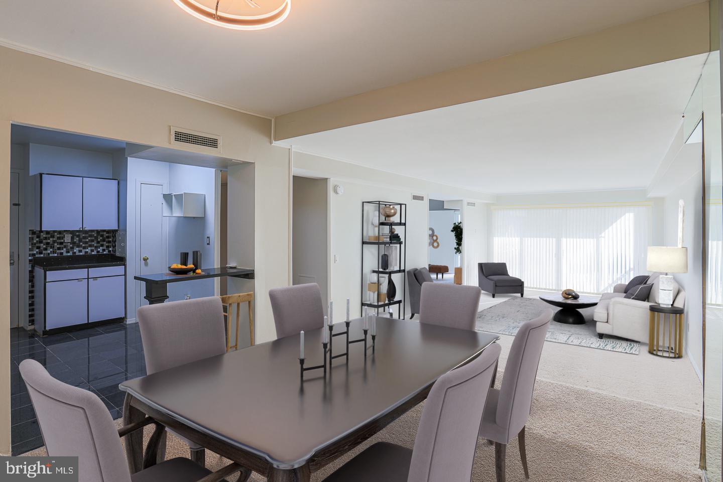 Space. Comfort. Convenience. Value and Security —this condo delivers on all! Welcome to Imperial Condominiums located at 3601 Clarks Lane, Unit 424. Situated in a quiet, well-established community in Upper Park Heights, this condo offers security with a doorman, receptionist, and owner key fob entry after hours.  This expansive 2-bedroom, 2-bath condo offers one of the largest floor plans in the building—significantly larger than most units with over 1600 sq. ft. of well-designed living space. Enjoy the open-floor concept that flows seamlessly from the kitchen to the dining area and into a sunken living room, leading to a private 4th-floor balcony. Both bedrooms are generously sized and will accommodate king-size furniture.  The versatile den with a built-in bar offers the flexibility of a home office, lounge, or potential 3rd bedroom.  Enjoy the convenience of  a condo fee that includes GAS, ELECTRIC and WATER, adding exceptional value and PREDICTABLE MONTHLY COSTS. For your convenience there's one underground parking space and an additional storage unit which will be assigned after ownership.  Seller will provide a credit for a newly installed  HVAC system, as well as two months of condo fees at closing!  Estimates already in-hand. Last but not least, the condo is conveniently located 10-15 minutes to I-695, I-83, MTA bus stops and metro train stations.
If you’ve been waiting for a larger unit in a great location with flexibility and value—come see this one!
