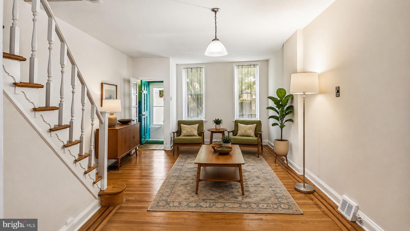 Located on a quiet, tree-lined Bella Vista block just steps from the Italian Market and less than a block from the beloved Fleisher Art Memorial, 706 Salter Street offers charm, light, flexibility, and meaningful updates in one of Philadelphia’s most vibrant neighborhoods. With year-round exhibitions, community events, and accessible art programming, Fleisher is a true neighborhood treasure and a special part of daily life in Bella Vista.

This one-bedroom, one-bath home lives larger than expected, with an open-concept second floor that offers excellent separation and the potential to recreate a two-bedroom layout if desired. The current bedroom area spans approximately 14 feet wide and features generous closet space, creating a comfortable and airy retreat. Just beyond, the former second bedroom has been opened into a lovely lounge area, perfect for reading, relaxing, or additional living space. An office nook with sliding glass doors leads to a private balcony, filling the upper level with beautiful southern light.

The kitchen was thoughtfully renovated in 2012 with custom cabinetry and timeless finishes, creating a warm and welcoming centerpiece of the home. The bathroom remains true to the home's South Philadelphia heritage, showcasing its classic vintage character.

Recent improvements include a new roof in 2020, new heating system in 2020, sewer pipe replacement to the street in 2025, new garbage disposal in 2026, washer replacement in 2022, and a replaced rear deck in 2019.

Bella Vista is known for its neighborhood feel, walkability, parks, restaurants, and everyday conveniences. Enjoy being close to the Italian Market, Di Bruno Bros., Anthony’s Coffee, Sabrina’s Cafe, Fitzwater Cafe, Royal Tavern, Famous John’s Water Ice, South Street, Broad Street, Center City, and easy access to I-95 and I-76.