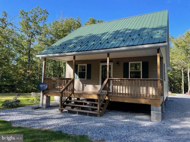 Welcome to your secluded 4 acre off-grid camp that offers a tranquil escape, features woods and cleared area.  
This well maintained 1 bedroom camp features include: Harmon wood stove, propane wall heat, laminate flooring, Kitchen appliances are included.  Oversized 12x24 garage for your toys. This property is equipped with a well and on-site septic. Abundant with wildlife. 
You can access the nearby Rails to Trails for your UTV/AVT riding enjoyment.  Enjoy leisurely hikes  ,bird watching, target practice, enjoy games in your back yard, evenings around your firepit enjoying S'mores.
**This property offers an easement, giving you access to thousands of acres of State Land*****