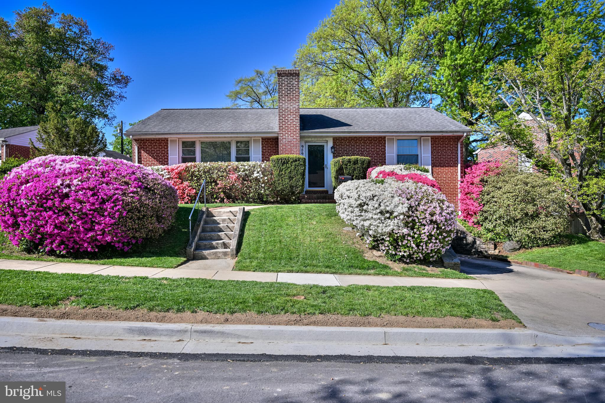 Welcome to this beautiful home in the Knollwood community of Towson! From the moment you step inside, you’ll be greeted by a light-filled living room featuring hardwood floors and a cozy wood-burning fireplace.  The formal dining room, also with hardwood floors, is conveniently located to the eat-in kitchen, which makes every day cooking and entertaining a breeze.

At the rear of the home, a stunning four-season sunroom with a second wood-burning fireplace provides the perfect space to relax year-round. Accessible from both the kitchen and dining room, this inviting space overlooks the expansive rear yard complete with a brick patio and mature landscaping — ideal for cookouts, gardening, or simply enjoying the outdoors.

Also, on the main level you’ll find three spacious bedrooms, all featuring hardwood floors and generously sized closets. The primary suite includes a private ensuite bath with a walk-in shower and tile flooring. The hall bath offers a large vanity with abundant counter space and storage, tile flooring, and a tub/shower combination.

The lower level features a comfortable club room, laundry area, an additional full bathroom, and utility space. Inside access to the one-car garage is conveniently located at the rear of the basement. In addition to the garage, the home offers driveway parking for another vehicle, plus ample street parking for guests.

Nestled on a tree-lined street and conveniently located near shopping, restaurants, parks, hospitals, downtown Towson, and I-695, this home offers the perfect blend of natural beauty and everyday convenience.