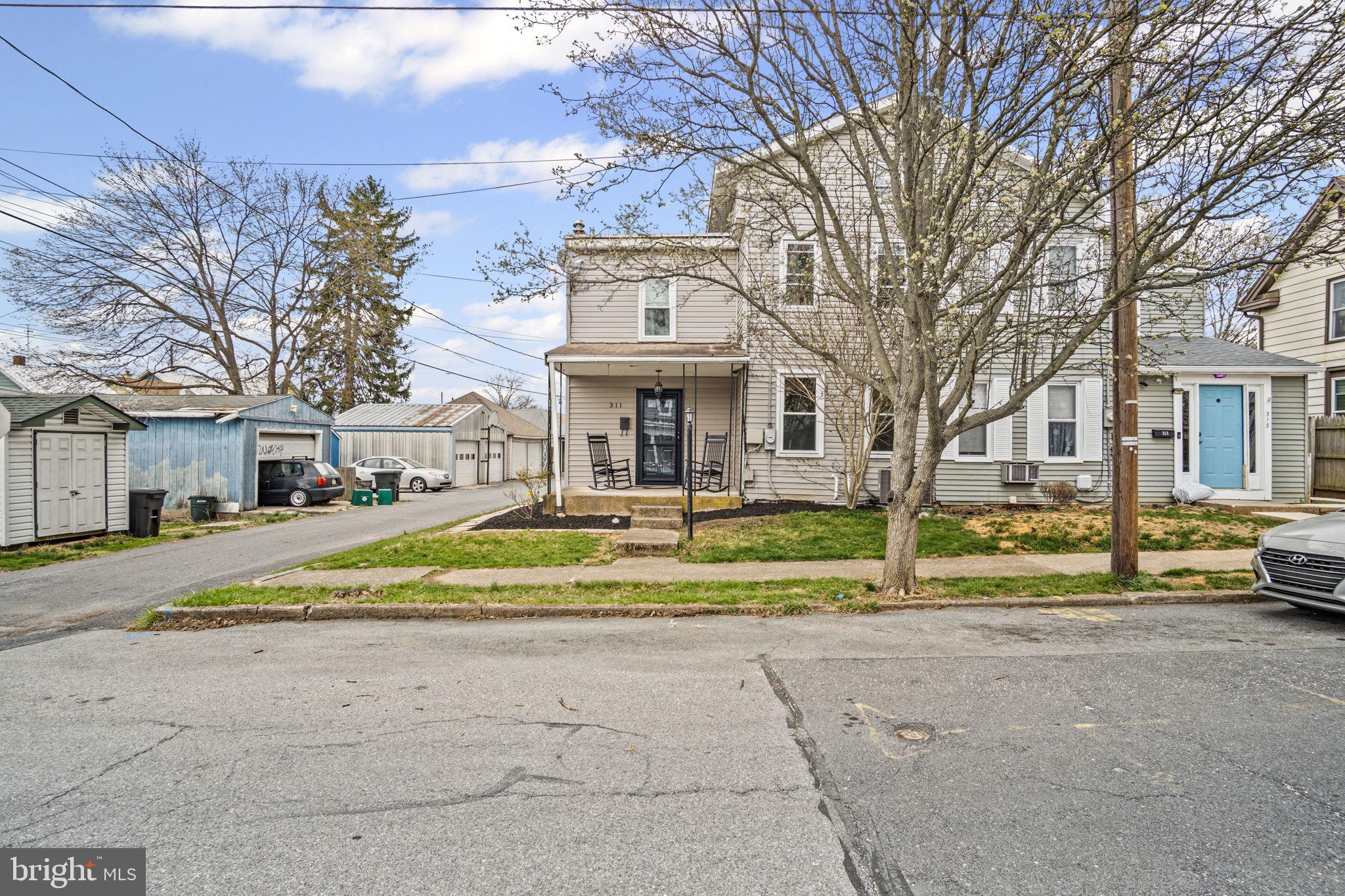 Nestled in the desirable Mechanicsburg Boro, this beautifully maintained home seamlessly blends historic charm with modern updates. From the moment you arrive, you'll appreciate the classic curb appeal and thoughtful improvements throughout. Step inside to discover a warm and inviting living space featuring durable luxury vinyl plank (LVP) flooring that extends through the living and dining areas. The layout is both functional and stylish, perfect for everyday living and entertaining alike. The newly installed windows (under warranty) bathe each room in natural light while enhancing energy efficiency. The heart of the home boasts a new central A/C system (installed in 2023), ensuring year-round comfort. Upstairs, the generously sized bedrooms provide ample space, including a finished third-story room—a versatile retreat ideal for a guest suite, home office, or creative space. One of the standout features of this home is the enclosed sunroom/back porch, offering additional flexible living space to relax and unwind. Whether you envision a cozy reading nook, an indoor garden area, or a vibrant entertaining space, this bonus area adds charm and functionality. Outside, the seller is taking care of important updates, including a brand-new garage roof and repaired/replaced gutters, giving buyers peace of mind. Don't miss the opportunity to own this character-filled home with modern updates in a sought-after location. Schedule your private showing today!