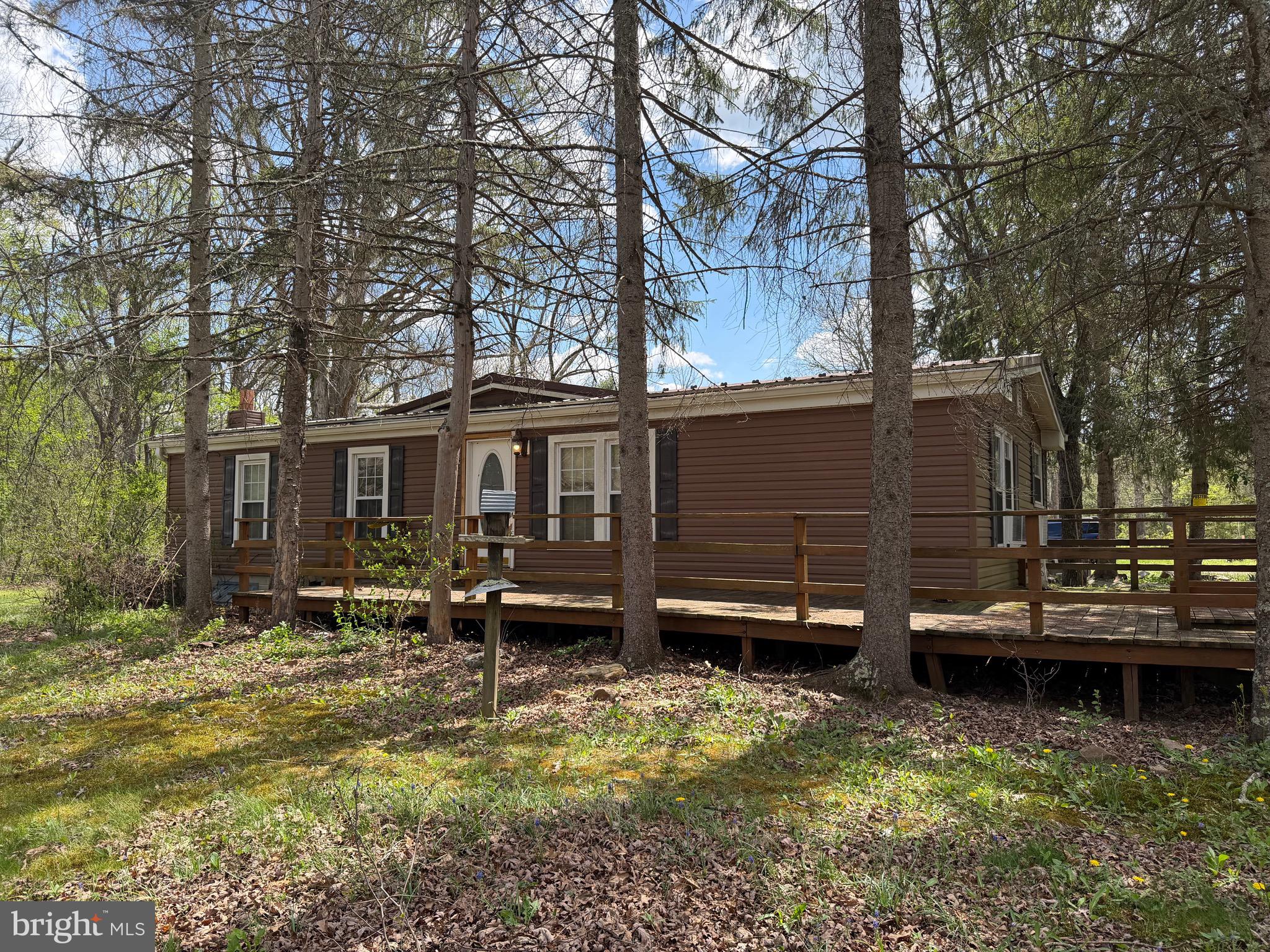 🏠 Offer deadline Friday May 1 by 4 pm 🏠 
Nestled in the peaceful mountain setting of Flintstone, this three-bedroom, one-bath ranch-style home sits on 5 private acres, offering the perfect escape for those seeking seclusion and outdoor adventure. 
It has a detached carport, a front wood deck and a covered rear deck for morning coffee or evening sunsets, and a metal roof perfect for listening to the rain. 
The home itself offers a solid layout with great potential but does need some TLC—perfect for buyers looking to put their personal touch on a property and build equity. Whether you're envisioning a cozy full-time residence, a weekend getaway, or a hunting retreat, this property provides a rare opportunity to create something truly special.

If you're looking for privacy, acreage, and the charm of a mountain setting, this property is ready for its next chapter.