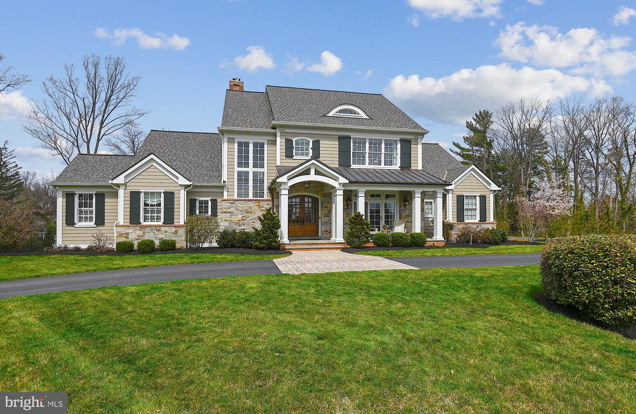 Welcome to the Storybook enclave of Hampton Park tucked away in a prime Lutherville location. Step onto the bluestone Covered Front Porch & enter through the  mahogany double doors into a gracious Foyer. No detail was overlooked in this  one of a kind, custom built home.  The spacious yet private Main Level Home Office is immediately on your right & has  2 built-in desks, built-in shelving, a seating area and opens to a coveted Front Porch.  The Main Level Primary Suite has a tray ceiling, oversized moldings, 2 walk-in closets & dual Bathrooms. In the Bathroom Suite you will find a soaking tub, heated floors, heated toilets, custom vanities, nighttime lighting and a stunning  shared shower. The large Great Room with its stone (gas currently but convertible to wood burning) Fireplace, coffered ceilings, recessed lighting & built-in surround sound is open to  a magnificent Gourmet Kitchen and Dining area. Enjoy a true Cooks' Kitchen with a breathtaking 10 foot Quartzite center island (with wine shelving), 2 toned custom counter-to-ceiling cabinetry & professional grade appliances including: a paneled 36" stand alone Sub Zero Refrigerator & a paneled 18" stand alone Sub Zero Freezer, Wolf 36" 6 Burner dual fuel Range, microwave drawer & a beverage refrigerator.    The Dining area with its stunning shiplapped tray ceiling is off the Kitchen and overlooks the extensive backyard space.    Do not miss the whimsical Main Level Half Bath, separate Laundry Room (with built-in ironing board, custom granite sinktop & vanity) and the separate Mud Room. ten-foot ceilings  & live sawn oak flooring are throughout the Main Level. The Mud Room, complete with  4 custom lockers and storage space, is perfectly located off of both a separate side entrance and the 4 car attached Garage.  The Garage has 2 bays large enough for 2 cars each (one bay is oversized for larger vehicles) and epoxy flooring throughout.

There are french doors off the Great Room which lead to the covered bluestone patio with overhead gas heaters. Step down to the salt water heated Pool -- with a sunning shelf, fountain features & retractable daily use cover; Built-in Jacuzzi hot tub with Ipe wood surround; Outdoor kitchen with built-in gas grill, gas hook-up for a firepit, built-in trash caddy, outdoor refrigerator, outdoor TV, outdoor speakers & retractable awning. 

The Upper Level has 3 large Bedrooms.  Bright and sunny Bedroom  # 2  has a large wall of custom closets,  and an  Ensuite Bathroom. The Ensuite includes a soaking tub with a bubbler, TV, separate marble shower, & a custom oversized vanity. Bedrooms #3 & #4 share a Jack & Jill Bathroom which has a separate shower & toilet room.  All Bedrooms have Bottom Up/Top Down blinds, custom window treatments, recessed lighting, live sawn oak flooring and 9 foot ceilings.

The Lower Level includes a Family Room, Game Room, Yoga Room, Wet Bar, Full Bath and additional Storage and Utility Rooms.  The carpeted Family Room features a tray ceiling with recessed lighting, surround sound, a brick gas burning  Fireplace with a floating beamed style mantle & custom cabinetry and shelving. The Family Room opens to the Wet Bar & Game Room. The Game Room has hand scraped brushed hickory engineered flooring, wainscotting & recessed lighting. The Wet Bar has custom cabinetry, marble topped sink and a beverage refrigerator.  The Yoga/ Exercise Room has dimmable overhead lighting,  built-in speakers, unique weaved flooring & french doors to stairs that lead up to the Backyard. This room could be easily used as a 5th Bedroom as there is a closet / storage room as well.  Storage  & Utility Rooms & a Full Bath with subway tile, niched shower and custom vanity complete the Lower Level.

Do not miss out on the first resale in this unique New England inspired neighborhood with homes built by Benhoff Builders with its reputation for unsurpassed quality and character.