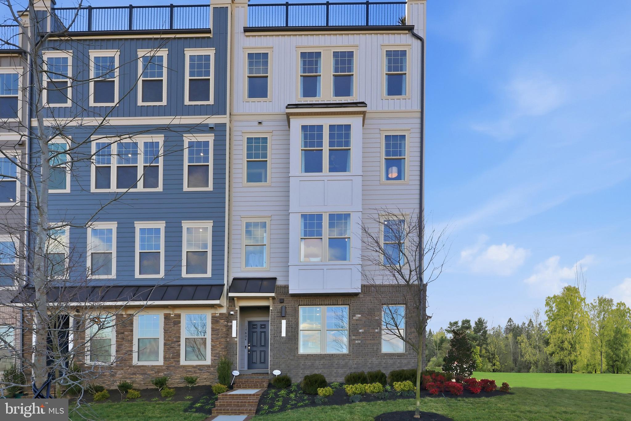 Best value in Potomac Shores — starting in the $400s, in a true resort-style community. Looking for a functional layout within budget without sacrificing your lifestyle? The Tessa offers two living levels, 1,560+ sq ft, private garage and driveway for two cars. Why this beats resale: • New construction + warranty • Builder incentives • Located in newest section walkable to vibrant future town center + VRE. For buyers comparing condo vs townhome — your water + sewer, exterior insurance + maintenance, Verizon internet, trash + recycle, landscaping, and all community amenities are included for just $331/month. No maintenance allows you to live–work–lay. Enjoy: • 3 Resort-style pools, newly renovated fitness center, and community events for all ages • Miles of wooded trails and waterfront access • Gardens, and sports courts • Jack Nicklaus Signature Golf Course + Tidewater Grill. Walk into the Tessa and discover a bright kitchen featuring designer enhancements, stainless steel appliances, and sleek quartz countertops. Natural light flows seamlessly in from the adjacent living room through its stunning expansive windows. Upstairs, discover the oversized primary bedroom, its two walk-in closets, and a contemporary en-suite bathroom with double sink vanities and a step-in shower. Down the hall you’ll find a beautiful, modern bathroom, convenient laundry, two additional bedrooms perfect for guests or a bright office space. Ask us about current incentives. Are you ready to call Potomac Shores home? 
*Photos are of a similar home. *