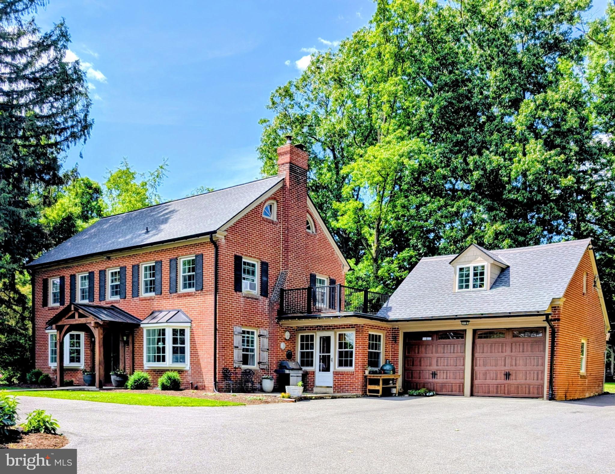 This  property is being offered at a live on site Public Auction on Wednesday, July 22, 2026 at 6pm.  This listed price is not the sale price and property may sell for higher or lower than this list priced at public auction subject to seller confirmation of price.  Auction Terms:  10% down payment day of auction, balance of purchase price by September 3, 2026, Buyer pays all realty transfer taxes, property taxes prorated at settlement, property sold in "as is" condition.  Property consists of a well built and kept, stately 2 story home with attached 2 car garage and outbuildings on a 4.3 acre +/- landscaped lot.  The brick dwelling contains 3 bedrooms, a full and half bath, formal living room w/brick fireplace, large country kitchen w/dining area and pantry closet, family area, den/office w/built in bookcase, and attached 2 car garage,  There is a large "L" shaped 2nd floor balcony with stairway access to ground level with a 12'x15' Guest Suite w/full bath  in addition to the house bedrooms and baths listed.  Additional improvements consist of a 16'x24' 2 story stone building with overhead and walk in doors, a 10'x10' stone building with a loft area and stone fireplace, a 14'x24' 3 stall horse shed and a 10'x'20 storage shed.  There is also a large fenced pasture area.  The rear yard has a pergola deck area, a firepit sitting area & more.  Other upgrades and features include a circular driveway that was recently paved, an updated front portico, replacement windows and much more.  Seldom does a property of this caliber with acreage come available in the Gap area.  Great location with easy access to major routes and shopping.  Seriously for sale - Don't miss it!!!