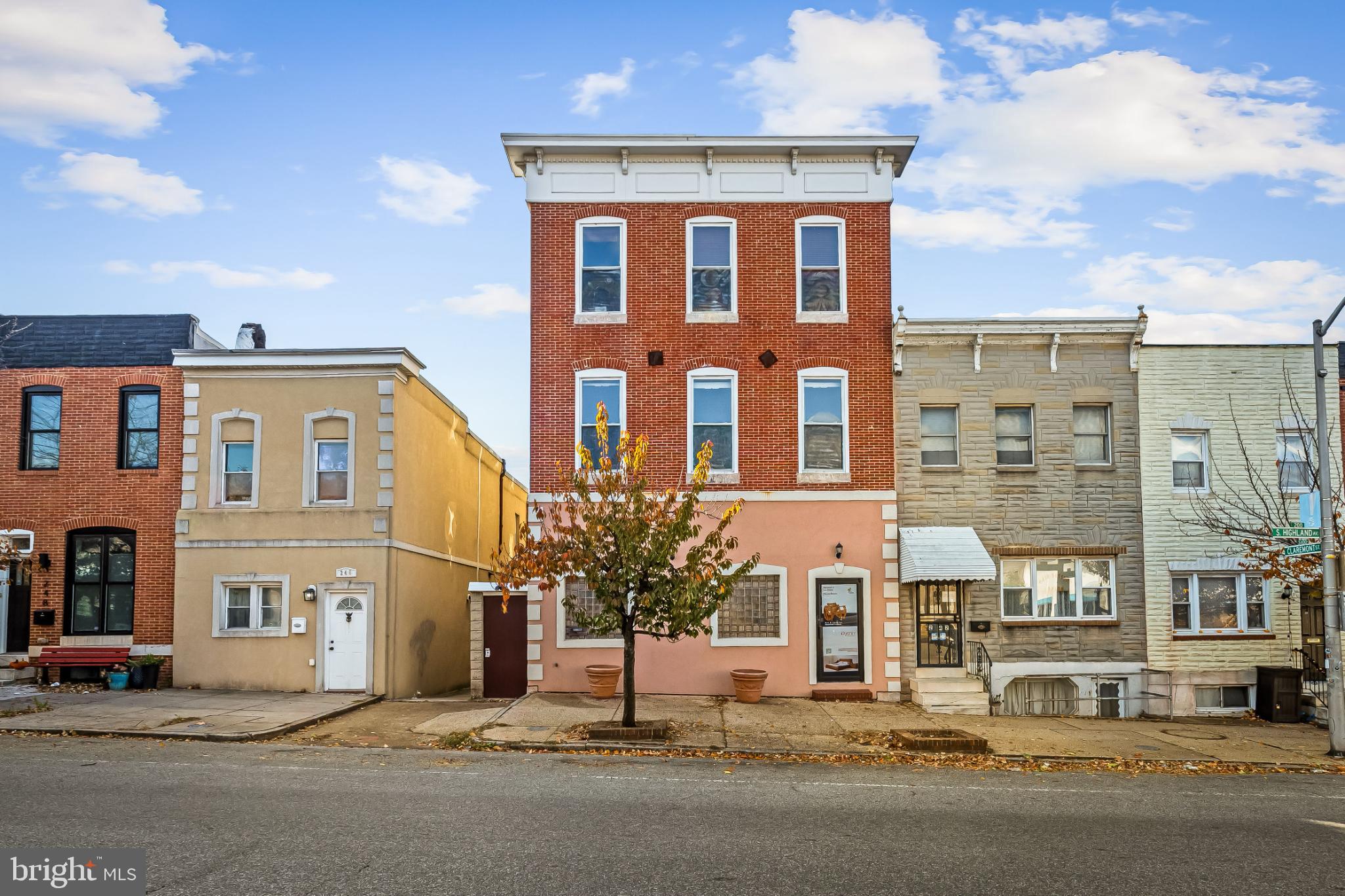 Former Moose Lodge and one-time home of the Creative Alliance, this property offers a wide range of uses all under one key. The current configuration includes a showroom, vintage club room in the basement, artist studios, and a two story residence. Located in Baltimore's Highlandtown Arts District, close to Patterson Park. Ideal for a live / work residence or income generating property. In additional to residential use, the current zoning allows accessory non-residential uses including; offices, personal service establishments (such as salons) retail, and restaurant. The main floor of the building is currently used as a furniture showroom. Beyond the showroom you'll find an under utilized commercial kitchen. The upper floors of the property are a blend of loft-style residence and photography studios. Each floor has a deck that offers skyline views of downtown Baltimore. You'll love the tin ceiling, the hardwood floors, and the flood of natural light through the east-west windows. Just listed, open house Saturday November 8th from 12pm-2pm. Equal housing opportunity.