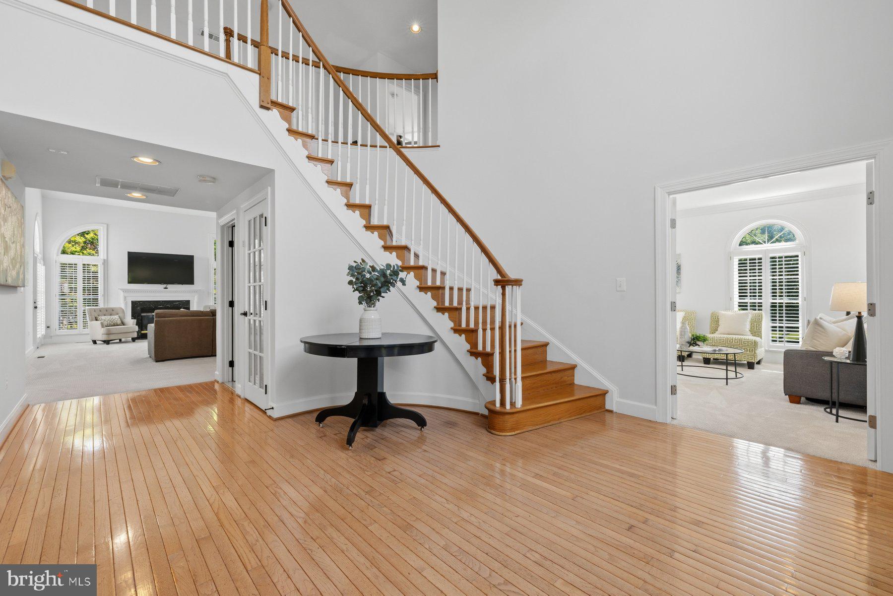 OPEN: Friday 5/8 4-6PM; Saturday 5/9 2-4PM & Sunday 5/10 4-6PM*****Discover an exquisite blend of elegance and comfort in this stunning Colonial residence nestled in the prestigious Regency subdivision. Spanning an impressive 4,691 square feet on the top two levels, this home boasts five spacious bedrooms and five full baths and two  half luxurious bathrooms. Step inside to find a grand entryway adorned with crown moldings and chair railings, leading into a gourmet kitchen that is a chef's dream. Featuring stainless steel appliances, including a built-in microwave, wall oven, and a generous island, this kitchen is perfect for culinary creations. The adjoining family room, complete with a cozy fireplace, invites gatherings and cherished moments. For those working from home, there is a large den/office with french doors for privacy. The thoughtful layout includes a formal dining room and an eat-in kitchen, ensuring ample space for hosting. In 2024, the formal living room was converted into a 2nd main floor primary bedroom, complete with a sitting area and a full bathroom, which is great for multi-generational living. Enjoy the convenience of additional features such as built-ins, recessed lighting, and walk-in closets that elevate everyday living. Leading from the breakfast nook is a screened porch and a large deck, allowing for outdoor entertainment. The outdoor yard is equally impressive, set on a corner lot of nearly half an acre, providing a serene backdrop for outdoor activities. The attached three-car garage with side entry adds to the home's functionality and curb appeal. With a full, daylight basement that is heated and improved, that includes a bar area, recreation area, work-out room, yoga/flex space and ample storage. The possibilities for customization are endless.                                                                                                                                                                                                    NOTABLE UPDATES: ****2025 Carpet replaced on the main floor, second floor, and basement.  2024: Main level bedroom sitting area and full bathroom. 2024 Attic Insulation sealed; 2023 Upstairs AC Unit replaced, 2023 Primary Bedroom on second floor updated, 2021 Asphalt Driveway replaced, 2020 Main floor AC and Heating unit replaced, 2019 Upper level Primary Bathroom windows replaced, 2017 Roof, Gutters and Front Door replaced. 2017 Hot water heater replaced.****
Located within walking distance to Loudoun Station where you will enjoy restaurants, shopping, and the Silver line metro station. Dulles Int. airport and the Dulles Greenway offers an exclusive lifestyle without compromising on accessibility. Experience the perfect harmony of luxury and comfort in this remarkable home.
--