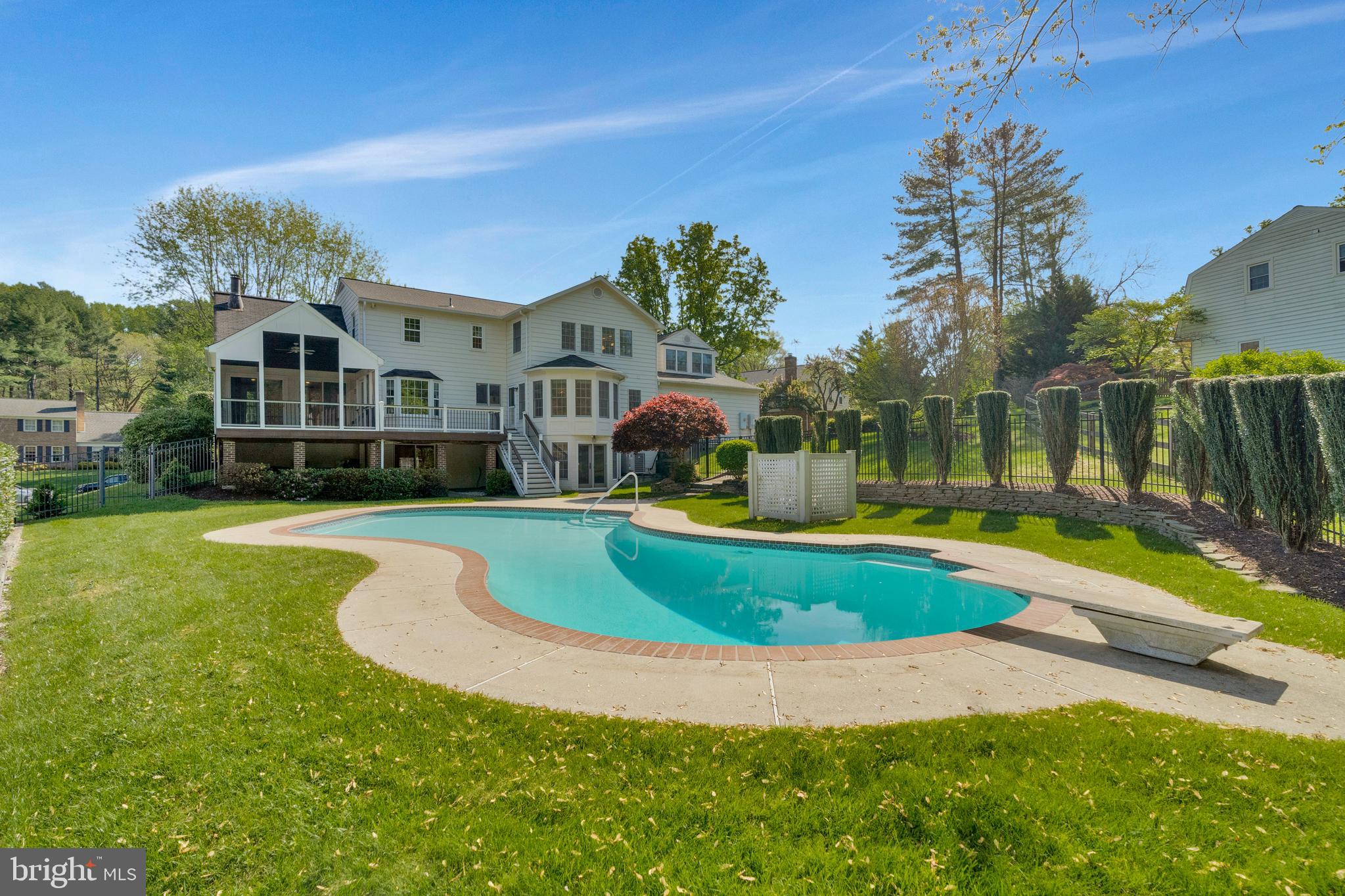 Welcome to this classic Colonial meticulously maintained by long-term owner.  Outstanding opportunity with $100,000 price reduction!  The residence is located in a desirable, extended neighborhood, close to Tysons Corner, Reston, and Leesburg Pike.  In addition, there are trails in the community that attach to the Cross County Trail and along very scenic Difficult Run that lead into Great Falls Park.  Enjoy top rated schools and the proximity to Wolf Trap National Park for the performing arts.  There are five bedrooms on the upper level, and a sunny sixth one on the lower level.  Enjoy all the beautifully updated bathrooms and kitchen, which includes a light and bright eat-in addition with three sides of windows.  A deck and screened-in porch overlooks the swimming pool and common property bounded by trees and nature;  the forest provides a beautiful backdrop and privacy all summer.  There are hardwood floors throughout the house.  In addition to the main level office, there is a "flex' space adjacent to the primary bedroom, plus tons of storage closets.  The garage includes an additional workroom space or storage for lawn care, sports equipment, etc.   From the garage enter through the marvelous, spacious mud room that has everything to offer:   cabinetry, large closet, washer/dryer and utility sink, extra refrigerator....and lots of space.  The free-form swimming pool offers a refreshing oasis for all ages, and there is plenty of lawn space outside the fence for games and sports.  The lower level features a wet bar and full bathroom for pool use.  This house offers charm, high quality, and functionality, all that has been lovingly maintained through the years.