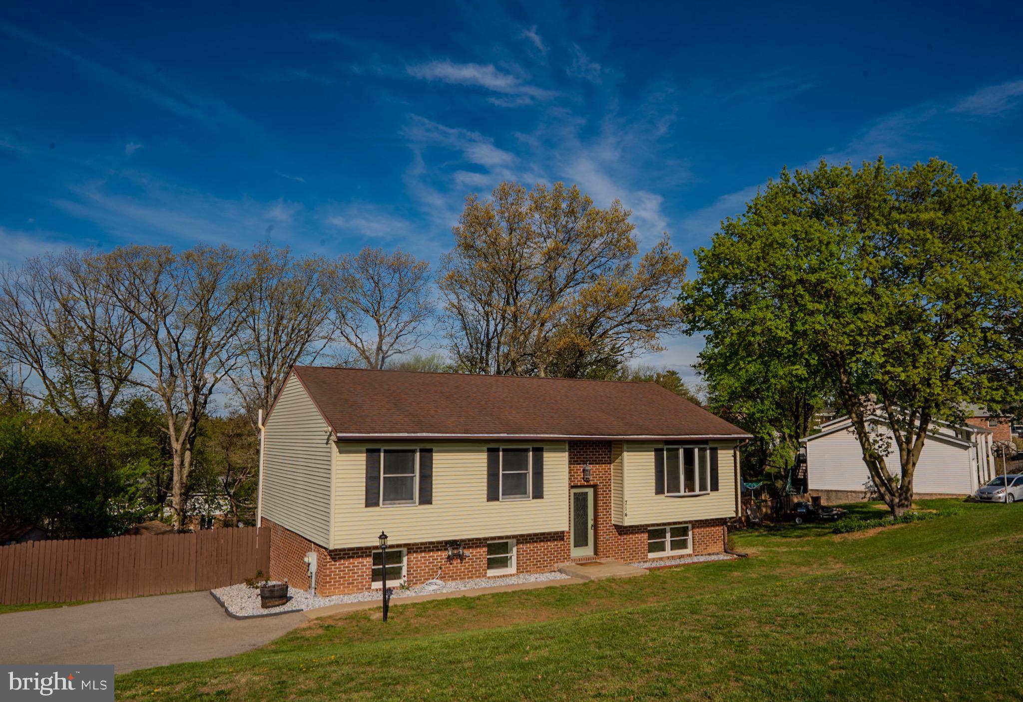 Back on the Market! Buyer financing fell thru! Thoughtfully redesigned 5 Bedroom, 3 Full Bath Split Foyer Home on .65 mature LOT in Walnut Ridge Subdivision.  3 bedrooms/2 full bath on main level, 2 bedrooms/1 full bath lower level, with large laundry room space, storage closet, and walkout door accessing backyard. Large deck off kitchen and dining area overlooking yard backing to trees. Fresh paint throughout, new flooring in basement,  updated ceiling paint and drywall in basement, new vanity in basement bathroom, new floors throughout basement, new dishwasher, new kitchen faucet, all new ceiling tiles in laundry room, and oversized driveway. Home also features a radon remediation system.