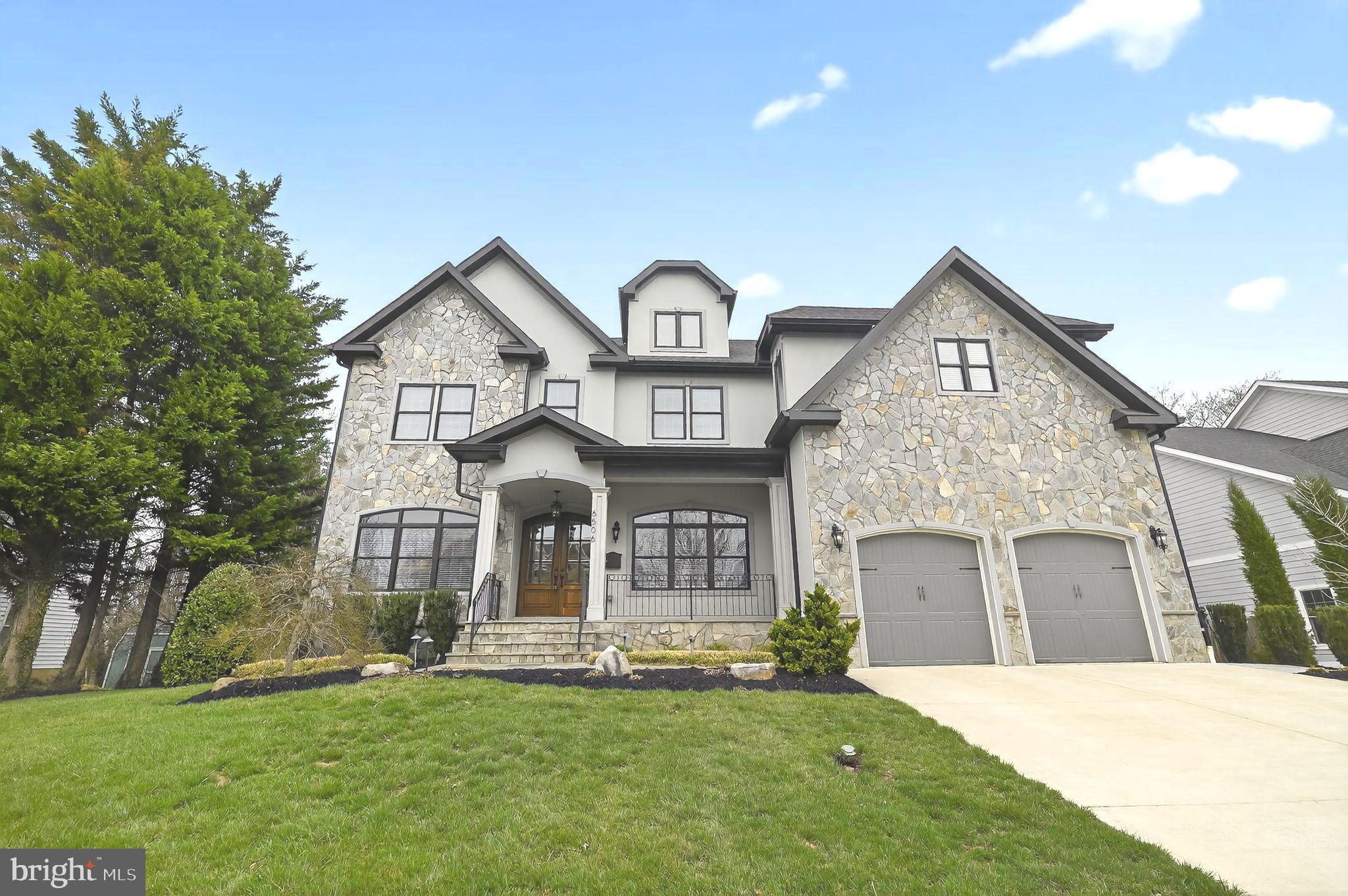 Rare Opportunity! Presenting an exquisite French Transitional residence where extraordinary craftsmanship and understated luxury define every detail. Located in the sought-after Chesterbrook Gardens neighborhood, 6506 Chesterfield Ave is an exceptional custom home offering seven bedrooms, seven full and two half baths, and over 7,200 square feet of thoughtfully designed living space across four beautifully finished levels.

From the moment you enter, the home reveals a seamless balance of sophistication and comfort. Solid hardwood floors extend throughout the main and upper levels, while abundant natural light fills the open and elegant floor plan. The main level is designed for both refined entertaining and everyday living, featuring a gracious living room, formal dining room, powder room, and a versatile private office or guest suite with a full bath.

At the heart of the home, the chef’s kitchen showcases a professional-grade Thermador appliance suite, including two dishwashers, a six-burner gas range with pot filler, wall ovens, and a refrigerator. A generous beautiful island anchors the space and is complemented by a walk-in pantry and a butler’s pantry with a beverage refrigerator. The kitchen flows seamlessly into a light-filled breakfast area and an expansive family room with coffered ceilings and a gas fireplace, while glass doors open to the rear deck, creating effortless indoor-outdoor living. A mudroom with built-in cubbies and a secondary laundry area adds everyday convenience.

The upper-level features four spacious bedrooms, each with its own ensuite bath. The luxurious primary suite serves as a private retreat, complete with a wet bar and beverage refrigerator, two custom walk-in closets, an additional dressing area, and a spa-inspired bath with soaking tub, glass-enclosed shower, dual vanities, and a dedicated makeup area. A large laundry room with cabinetry and sink completes this level.
The top floor offers an additional private bedroom with a full bath, ideal for guests or flexible living space.

Designed with entertaining in mind, the walkout lower level includes a guest bedroom with full bath, an expansive recreation room with half bath, a wet bar with a third beverage refrigerator, a media room or fitness space, and generous storage. The level opens directly to the outdoor patio, extending the home’s living and entertainment areas.

Additional highlights include three fireplaces, professional landscaping, custom window treatments throughout, multiple Restoration Hardware chandeliers, and a fully fenced backyard.
Ideally positioned just minutes from Washington, DC, multiple Metro stations, parks, shopping centers, and major commuter routes—and within the highly regarded Chesterbrook Elementary, Longfellow Middle, and McLean High School pyramid—this residence offers the perfect blend of architectural elegance, modern functionality, and exceptional McLean living.

All interior walls, including the garage, were freshly painted in 2026, and professional landscaping was installed in 2020. Move-in ready. Don’t miss the opportunity to tour this stunning home!