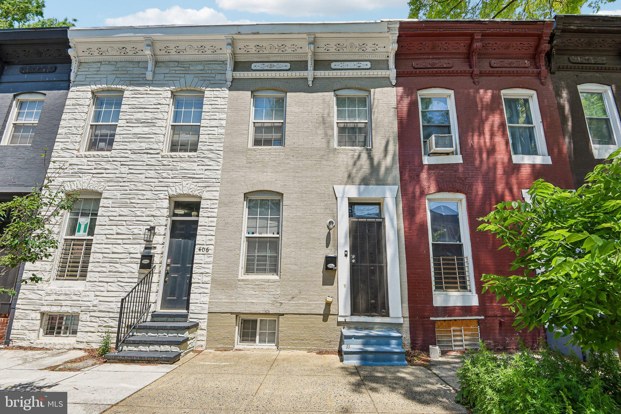 This classic Baltimore City brick row home offers a blend of character, functionality, and accessibility. The main level features wood floors and a practical layout. Located at the rear of the home, the kitchen provides direct access to the fenced backyard, creating an ideal setup for outdoor enjoyment, gardening, or entertaining. The partially finished basement offers additional flexible living space that can be used for a recreation area, workspace, storage, or hobby room. Enjoy easy access to I-83, Downtown Baltimore, Camden Yards, and M&T Bank Stadium, making commuting and city attractions easily accessible. Conveniently located near Charles Village, Johns Hopkins University, shopping, dining, parks, and neighborhood amenities, this home places you close to many of Baltimore’s most popular destinations.